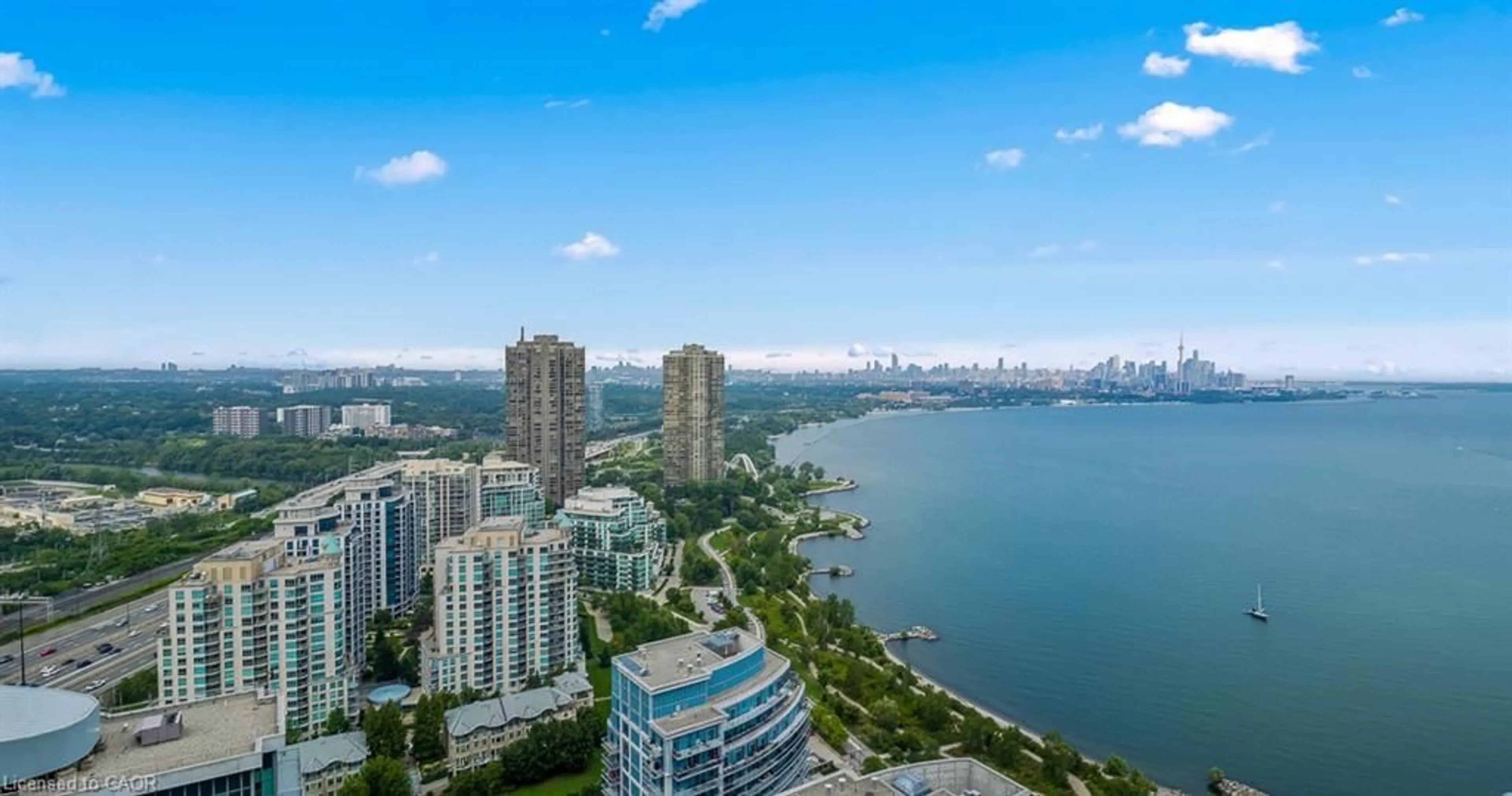 A pic from outside/outdoor area/front of a property/back of a property/a pic from drone, water/lake/river/ocean view for 16 Brookers Lane #3506, Toronto Ontario M8V 0A5