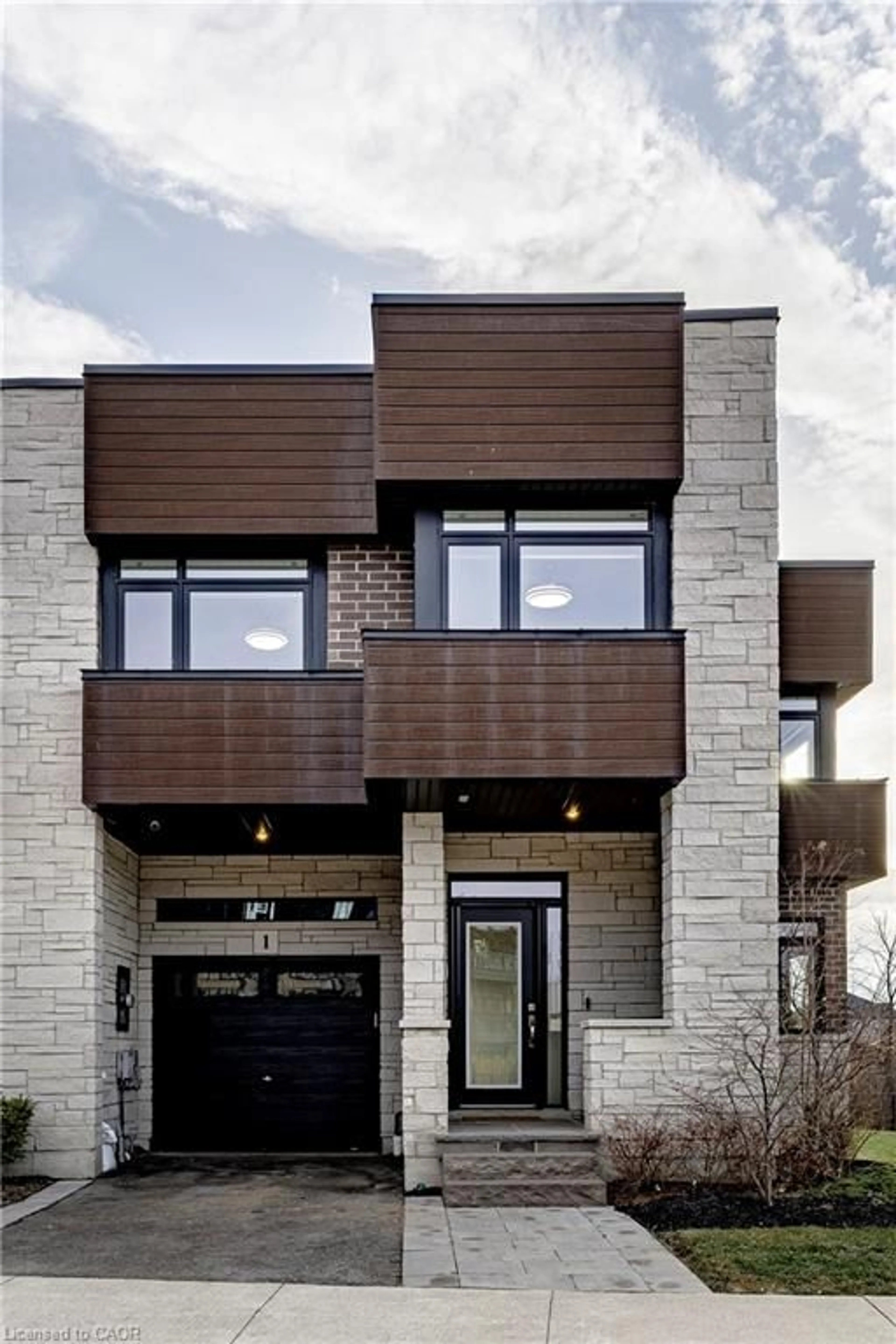 Home with brick exterior material, street for 35 Midhurst Hts #1, Hamilton Ontario L8J 0K9