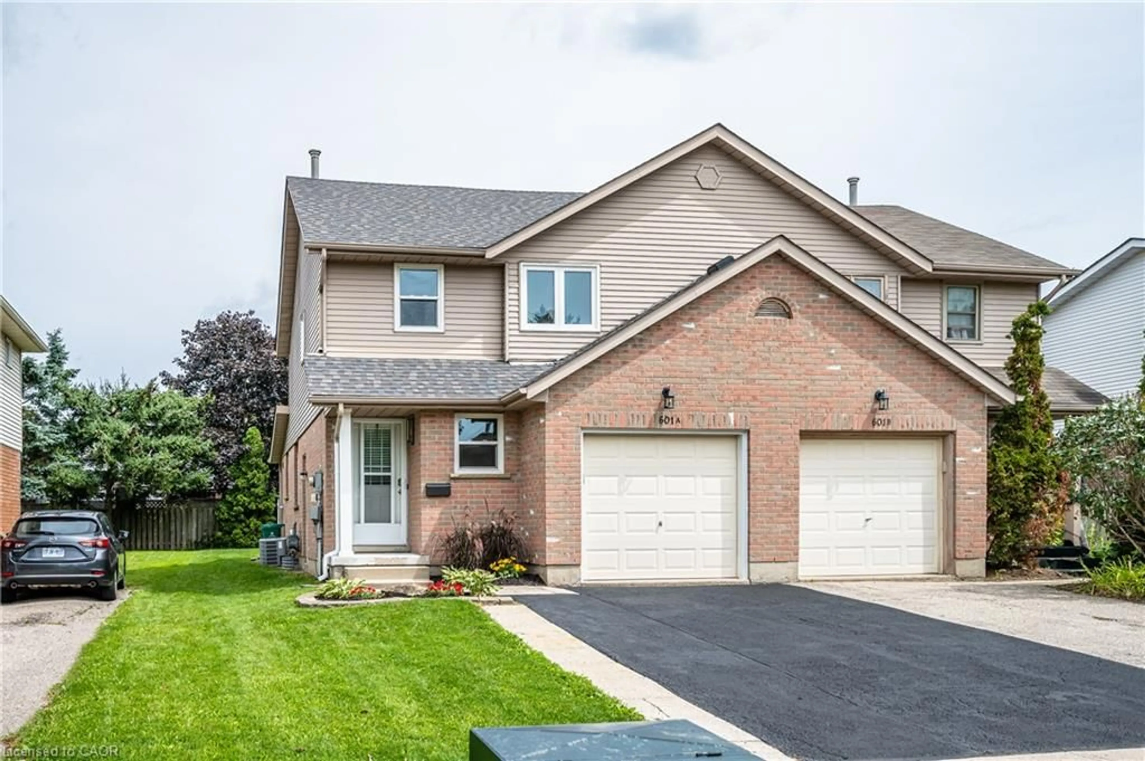 Home with brick exterior material, street for 601 Pinerow Cres #A, Waterloo Ontario N2T 2K6