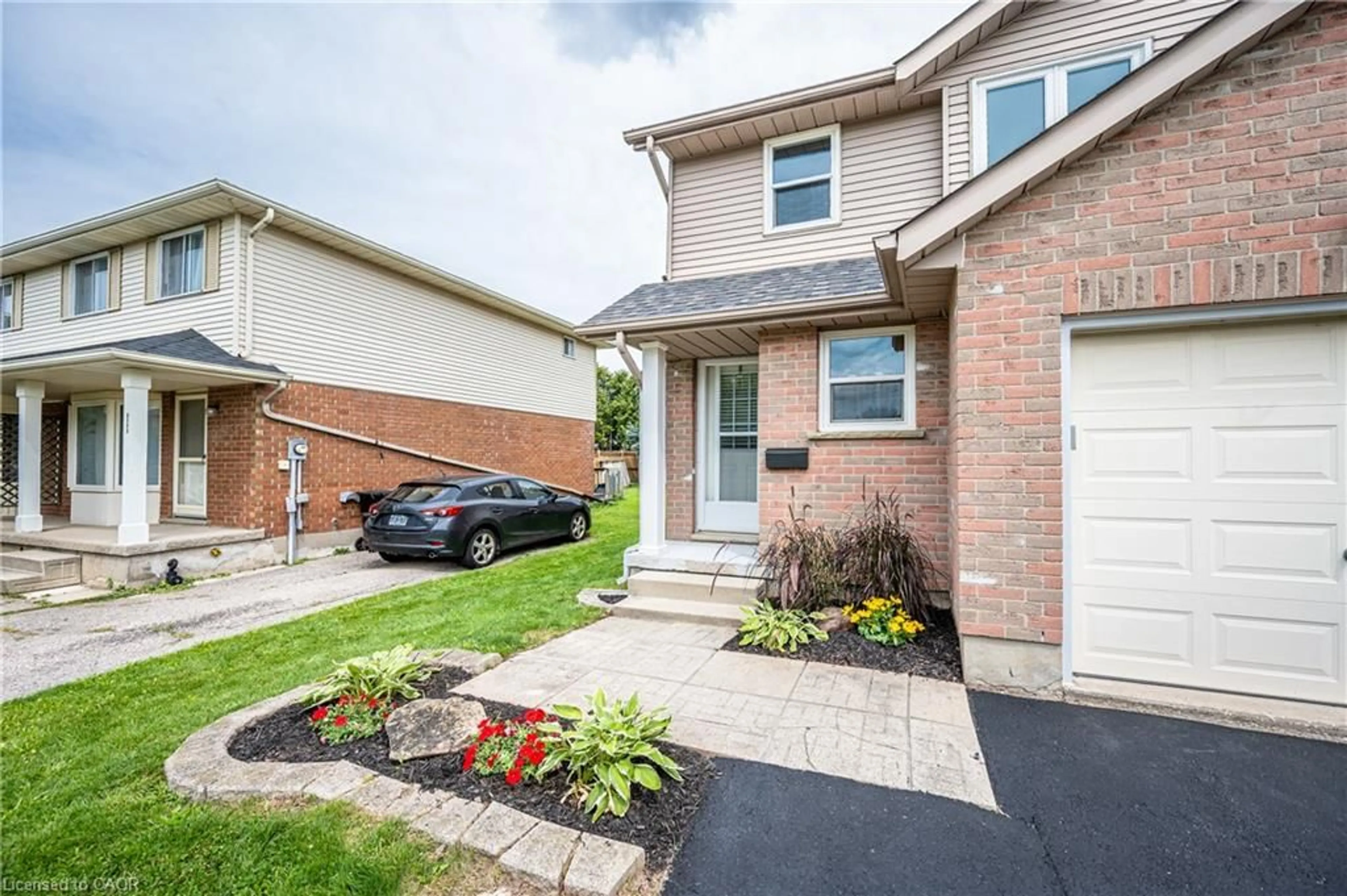 Home with brick exterior material, street for 601 Pinerow Cres #A, Waterloo Ontario N2T 2K6