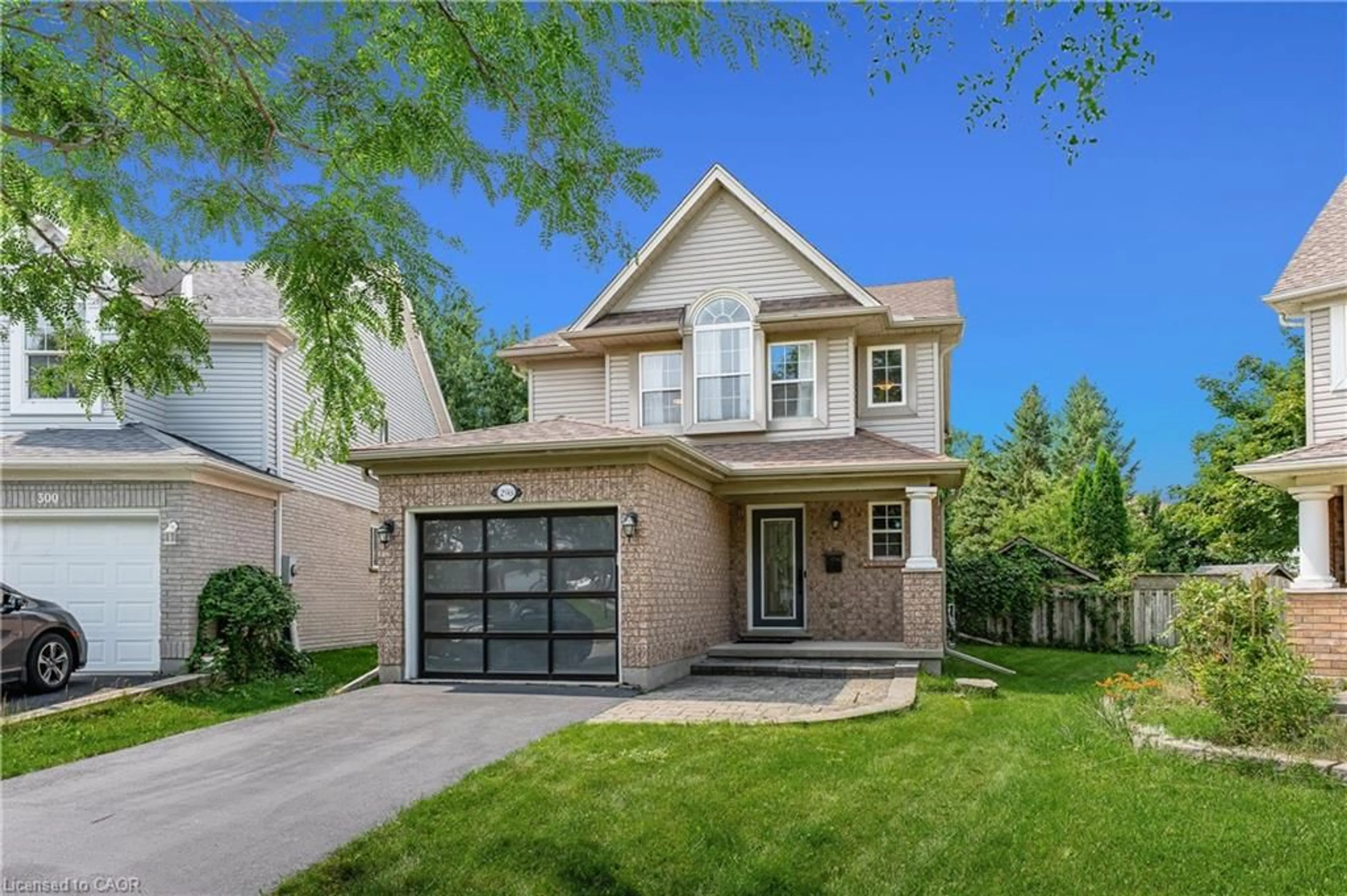 Home with brick exterior material, street for 298 Pineland Pl, Waterloo Ontario N2T 2S7