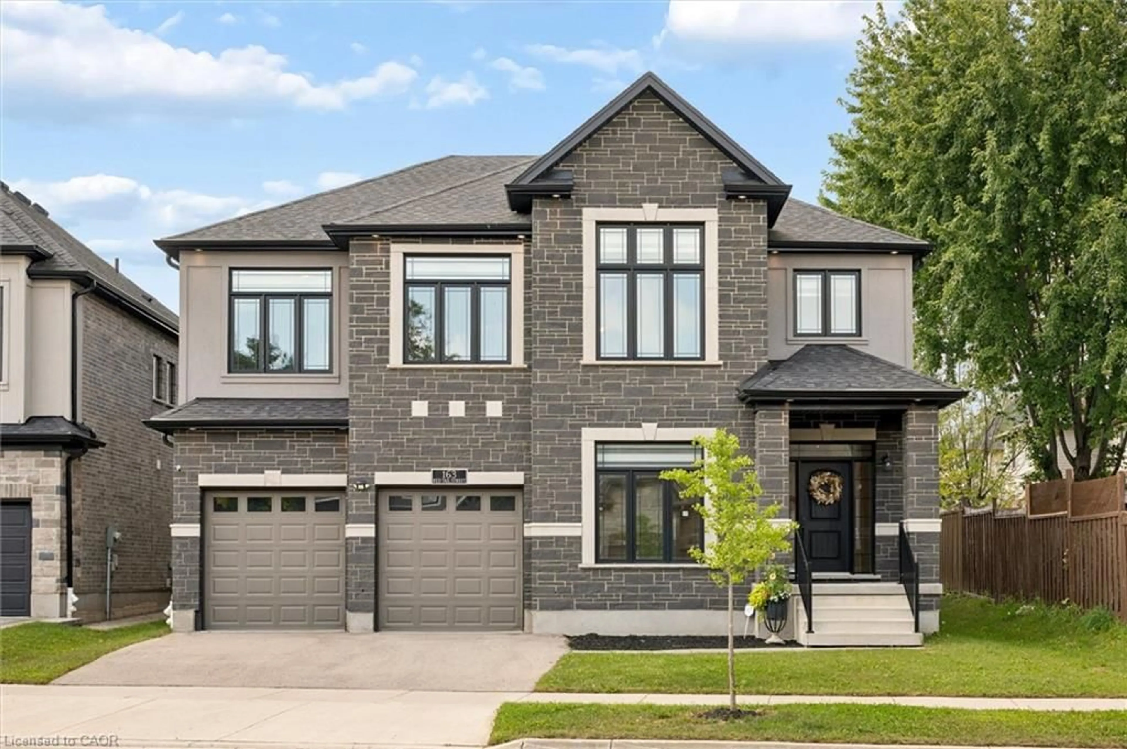 Home with brick exterior material, street for 163 Redtail St, Kitchener Ontario N2K 0E4
