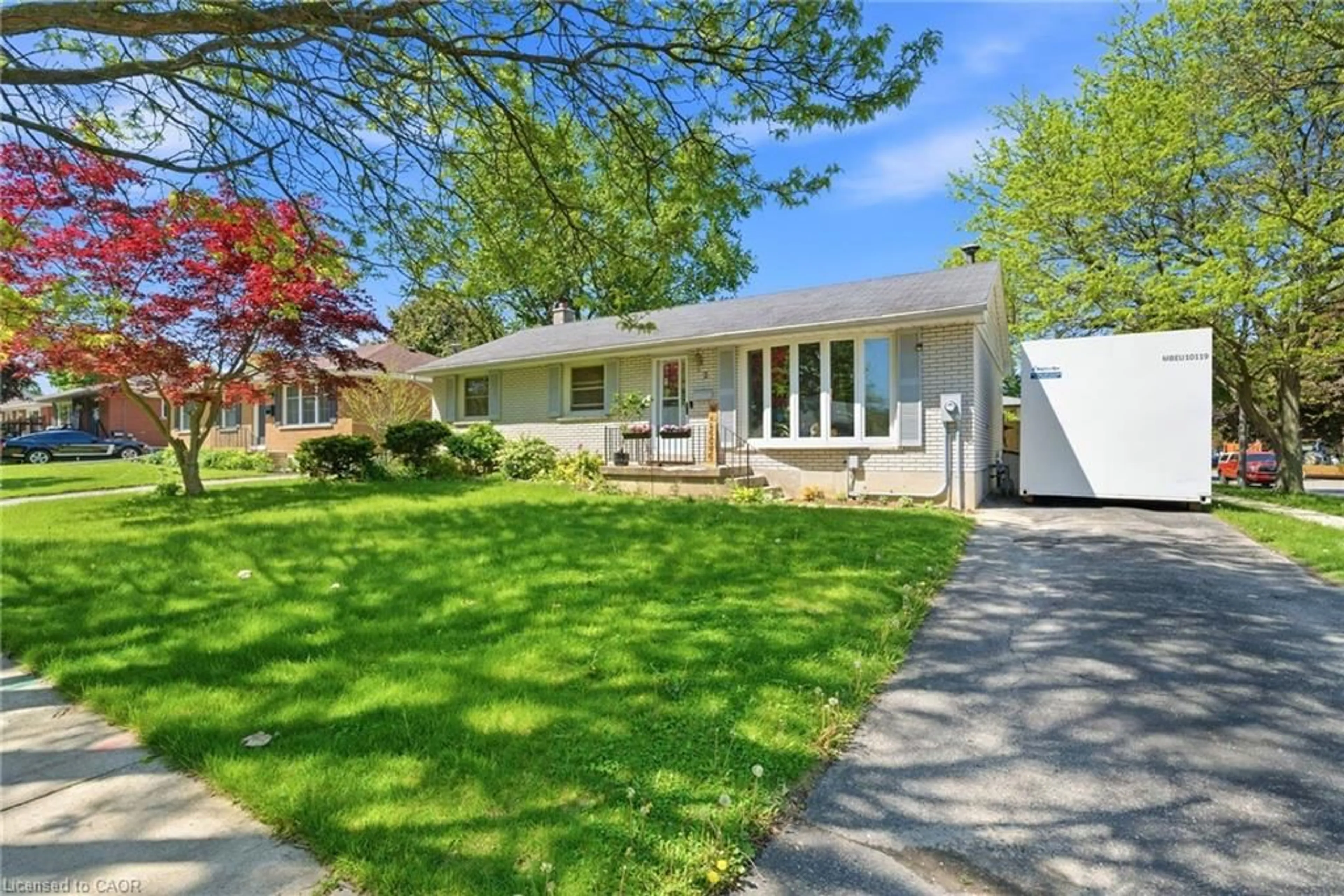 Home with vinyl exterior material, street for 2 Morning Dew Dr, Brantford Ontario N3R 3P2