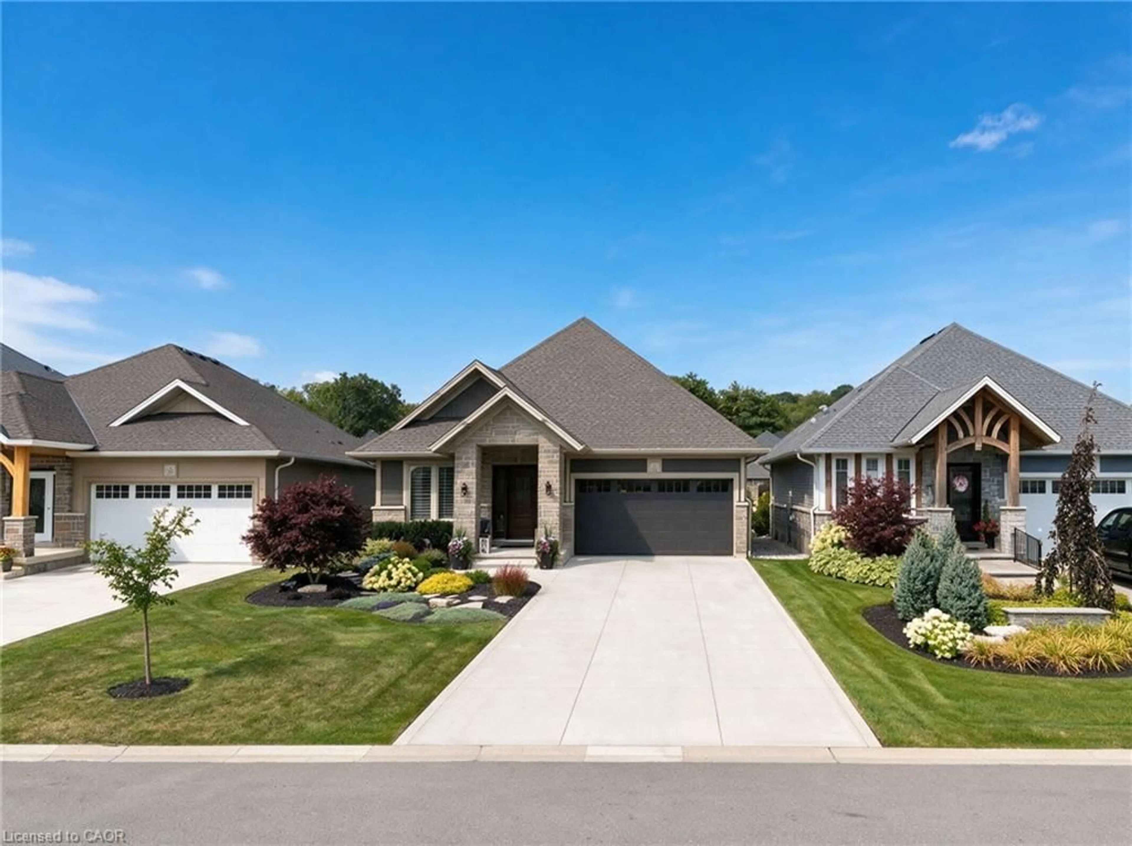 Home with brick exterior material, street for 47 Bluenose Dr, Port Dover Ontario N0A 1N7