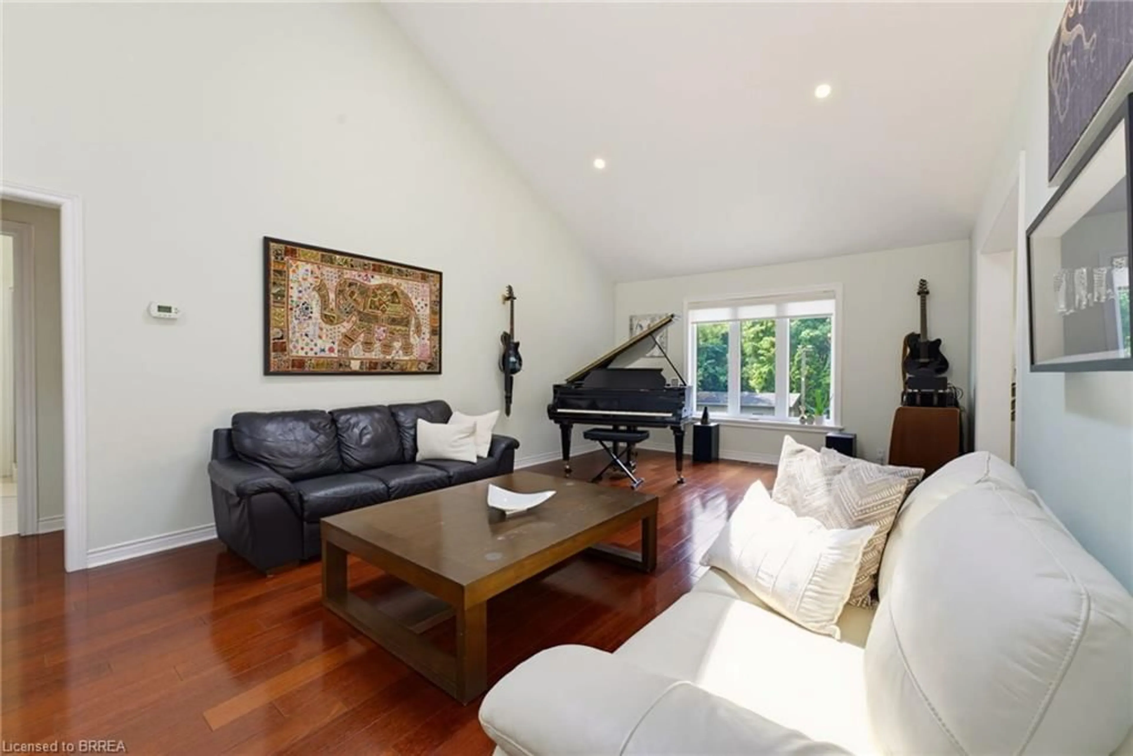 Living room with furniture, wood/laminate floor for 27 King William St, St. George Ontario N0E 1N0