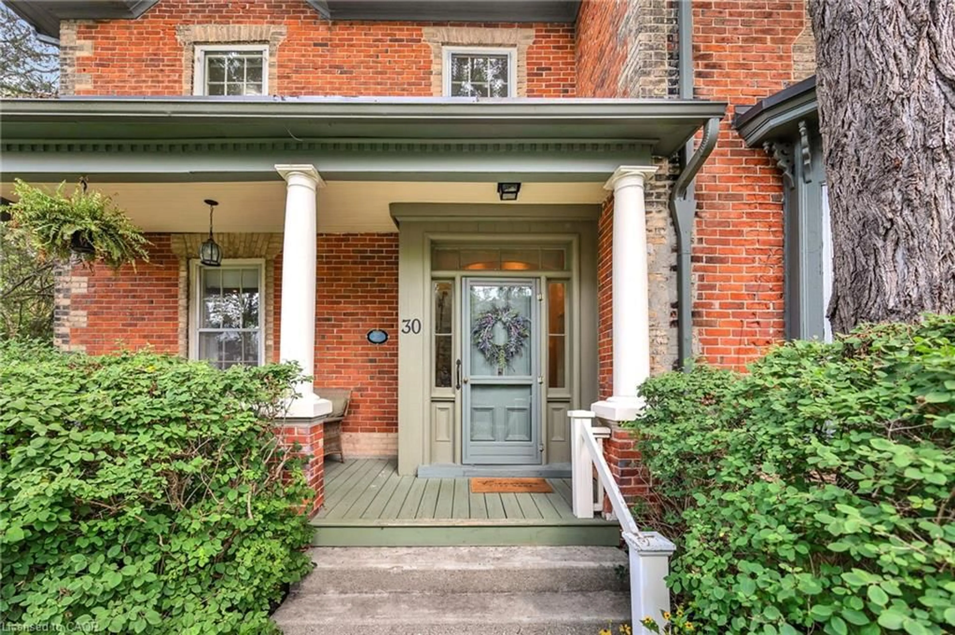 Home with brick exterior material, street for 30 Moir St, Elora Ontario N0B 1S0