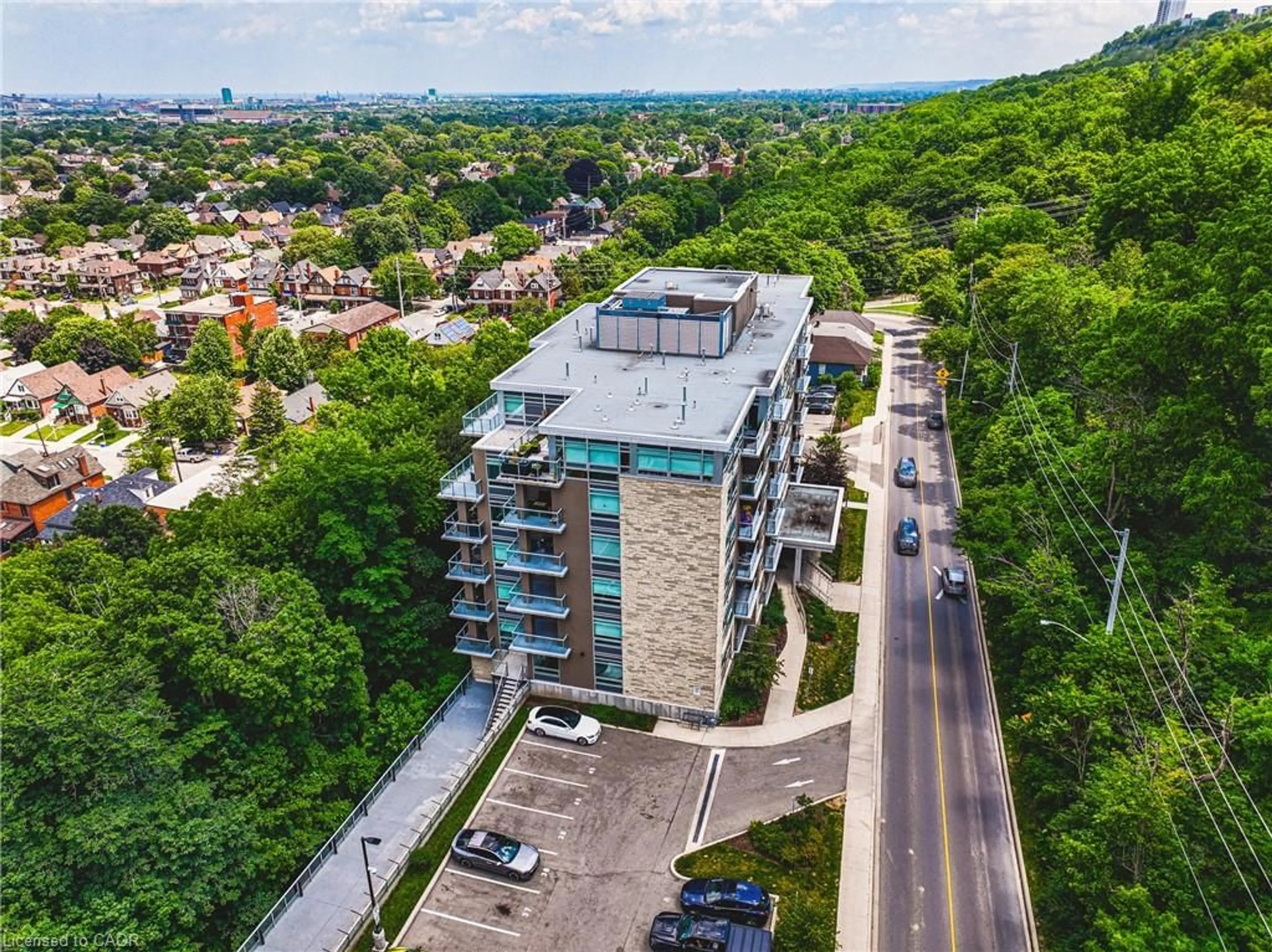 A pic from outside/outdoor area/front of a property/back of a property/a pic from drone, city buildings view from balcony for 479 Charlton Ave #105, Hamilton Ontario L8N 0B4