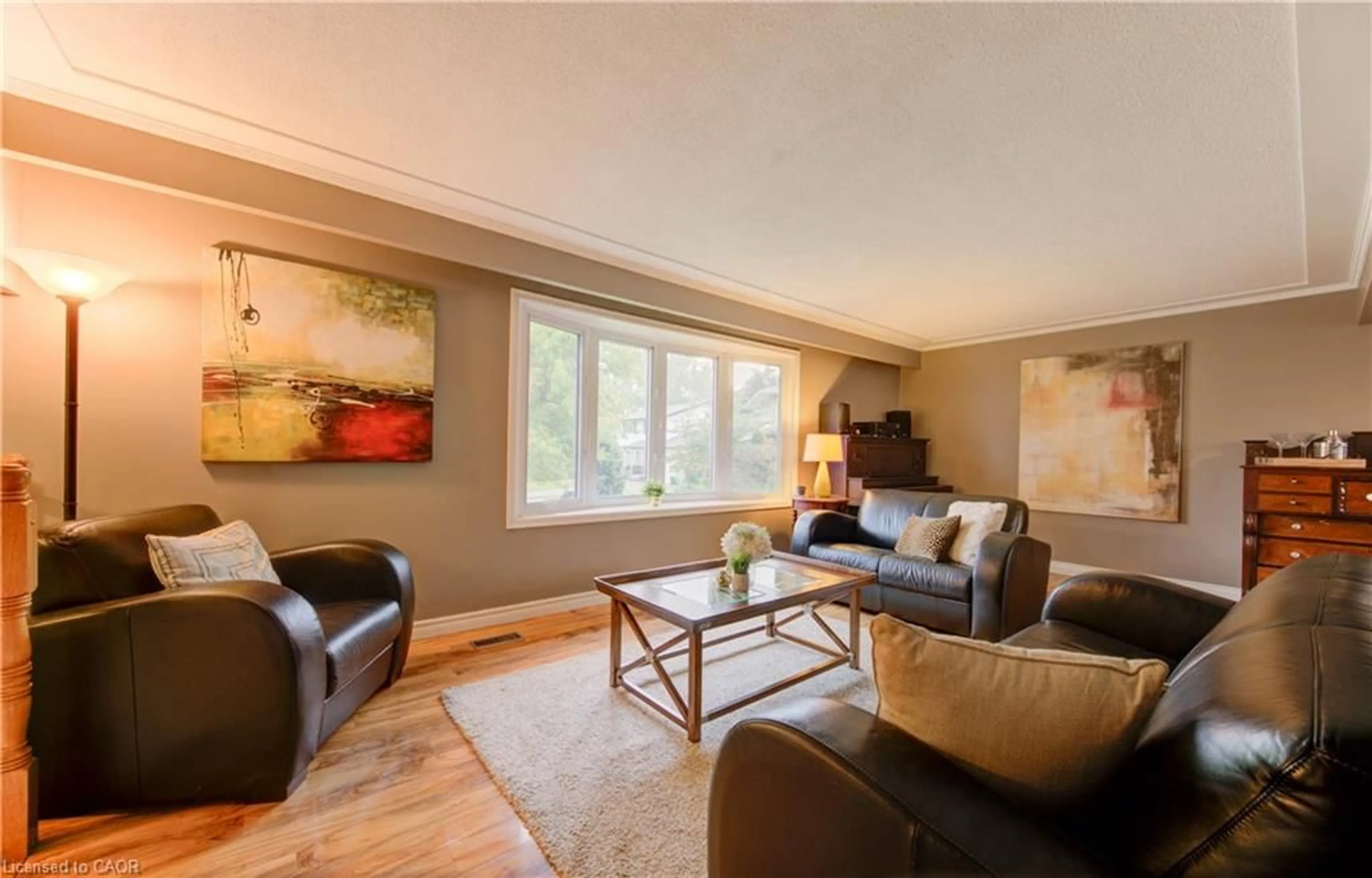 Living room with furniture, wood/laminate floor for 298 Creighton Crt, Waterloo Ontario N2K 1W6
