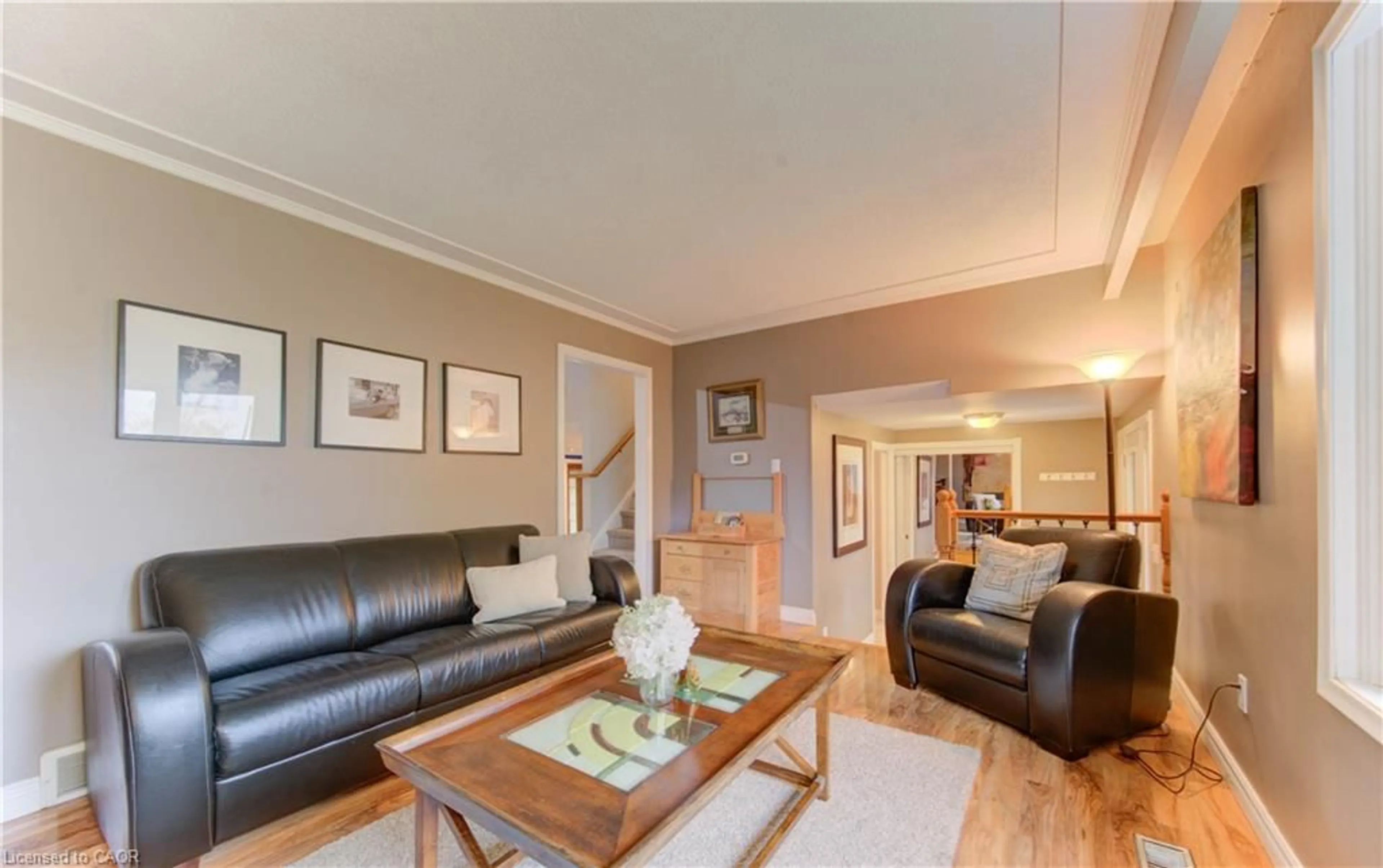 Living room with furniture, wood/laminate floor for 298 Creighton Crt, Waterloo Ontario N2K 1W6