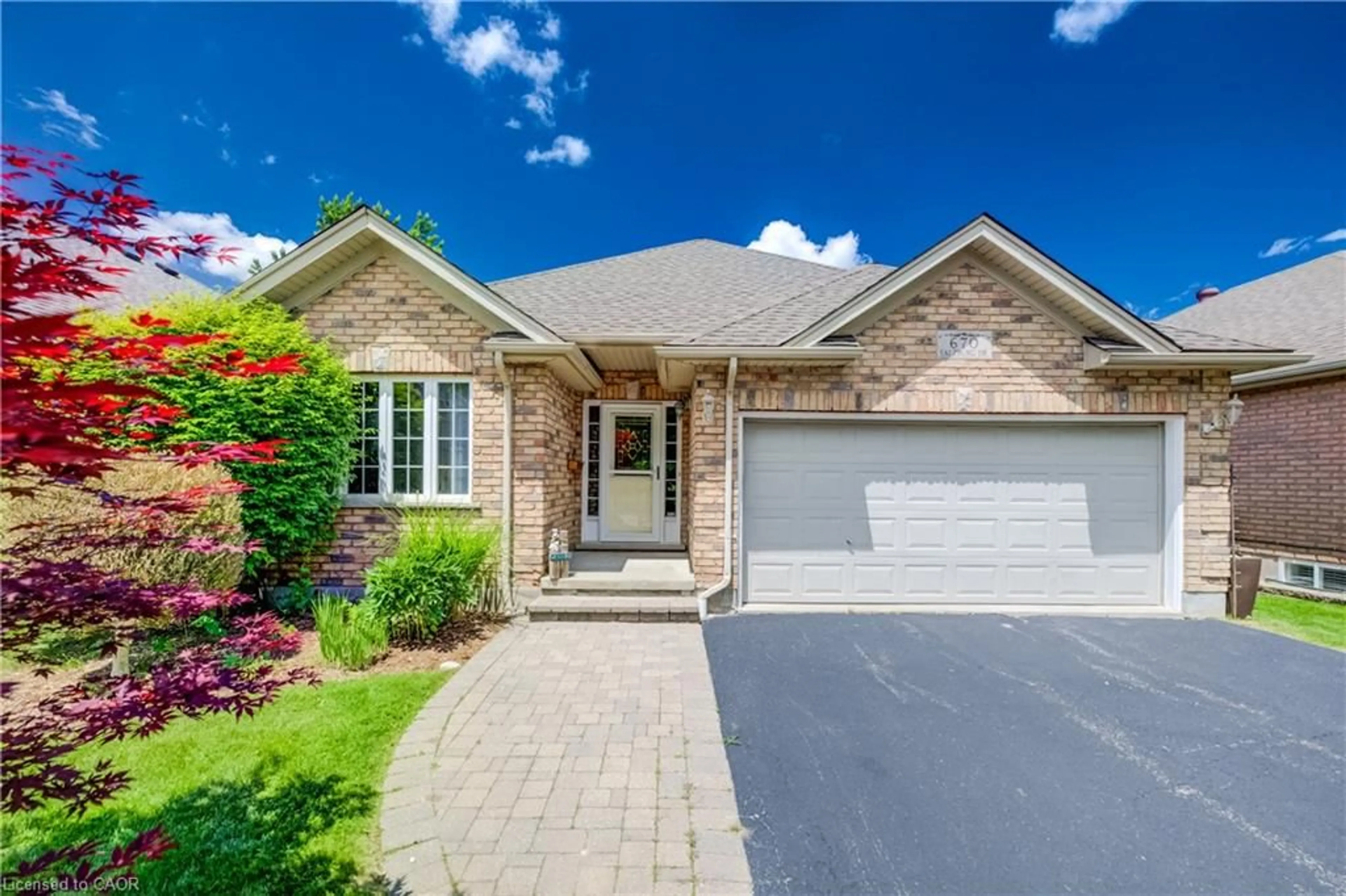 Home with brick exterior material, street for 670 Salzburg Dr, Waterloo Ontario N2V 2N8