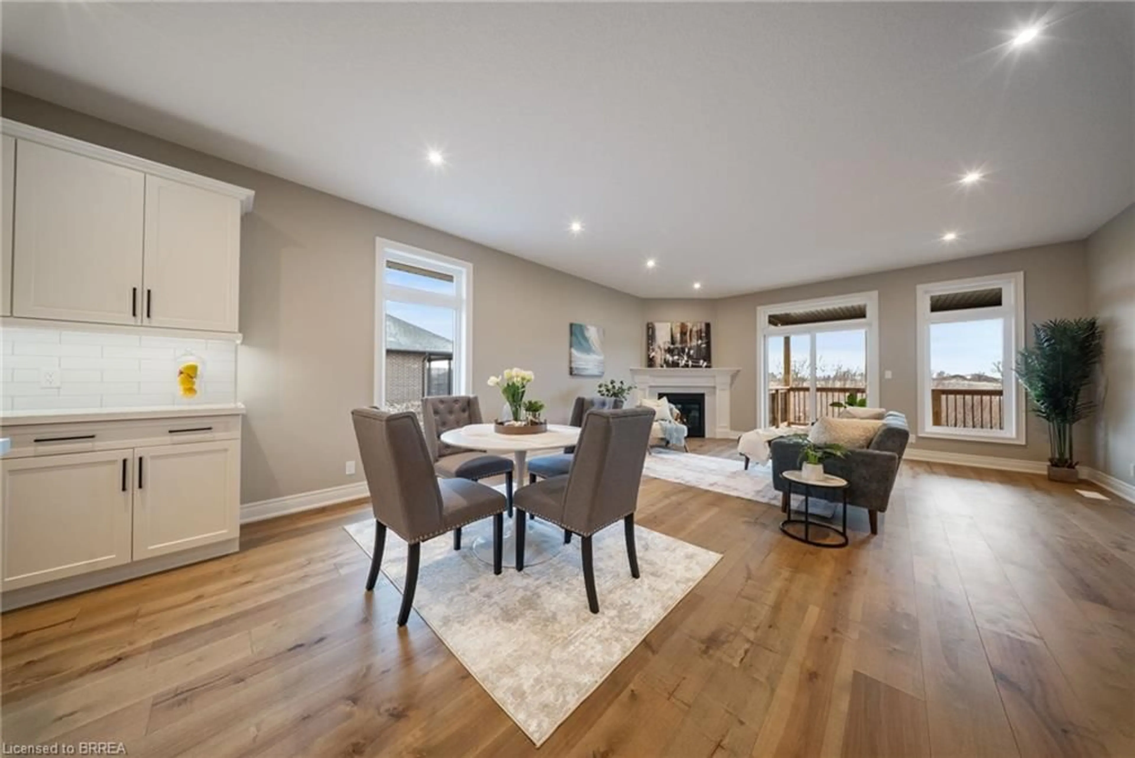 Living room with furniture, wood/laminate floor for 147 Craddock Blvd, Jarvis Ontario N0A 1J0