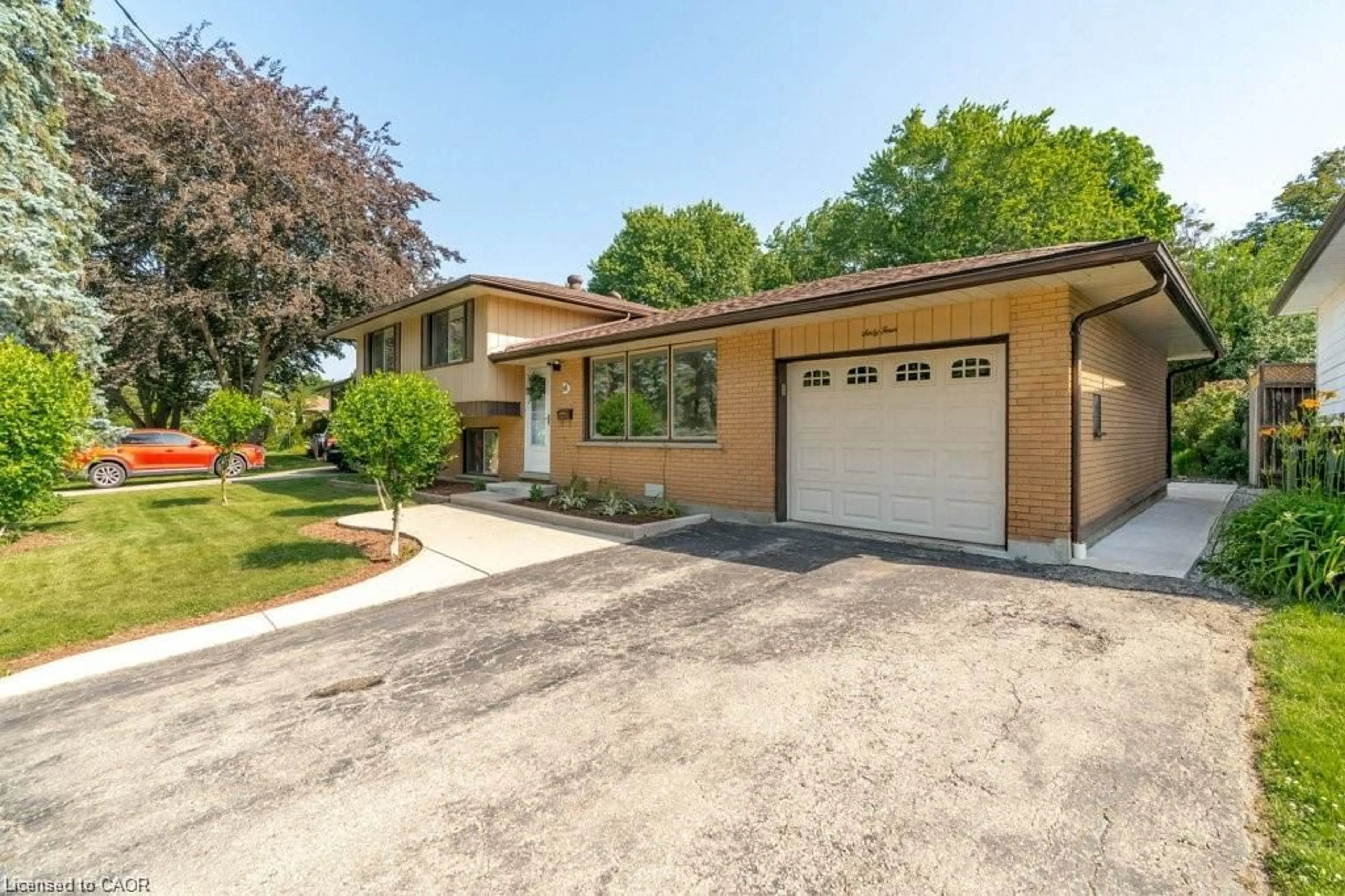 Home with brick exterior material, street for 64 Warren Rd, Kitchener Ontario N2M 4T4