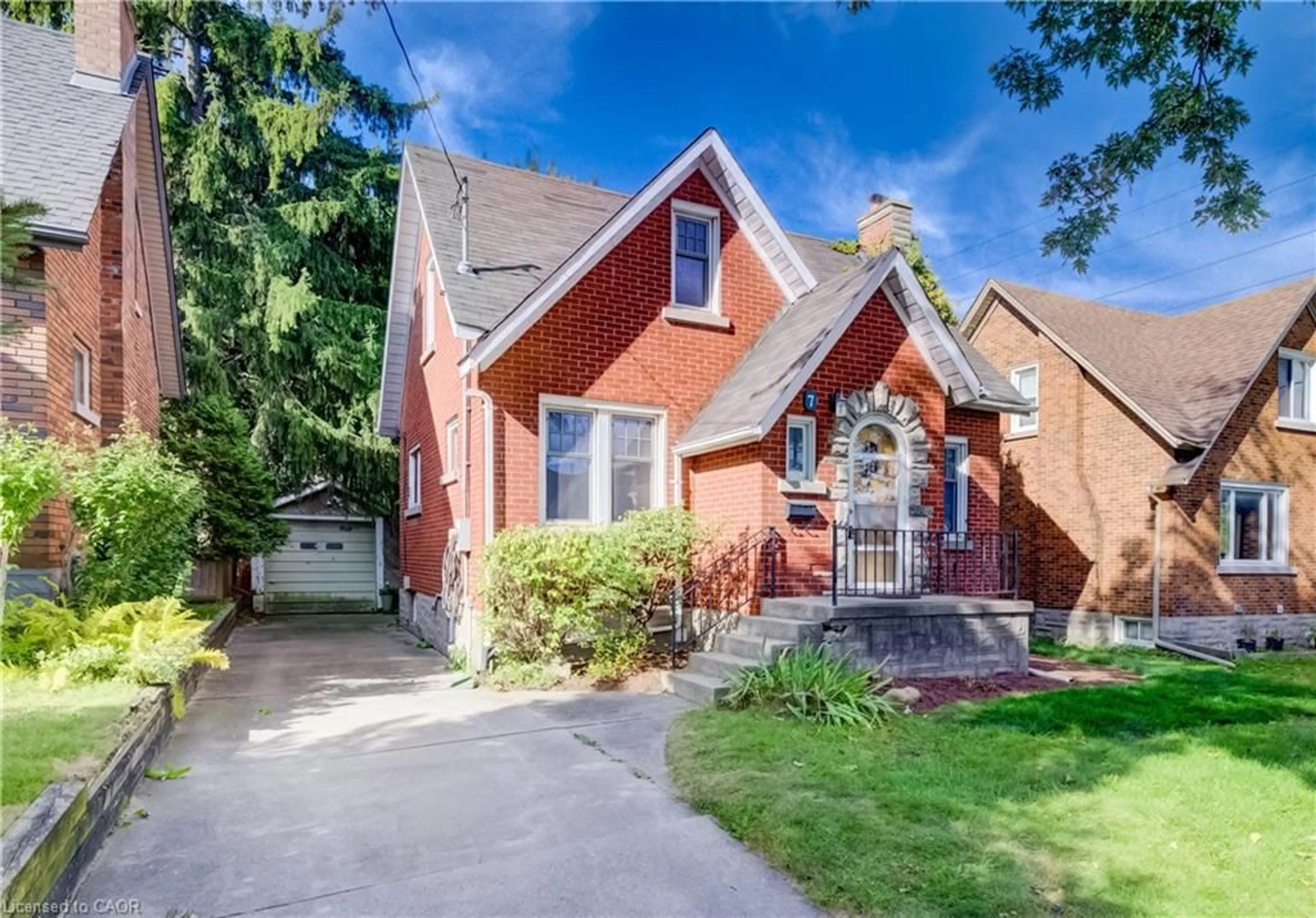 Home with brick exterior material, street for 7 Locust St, Kitchener Ontario N2H 1W6
