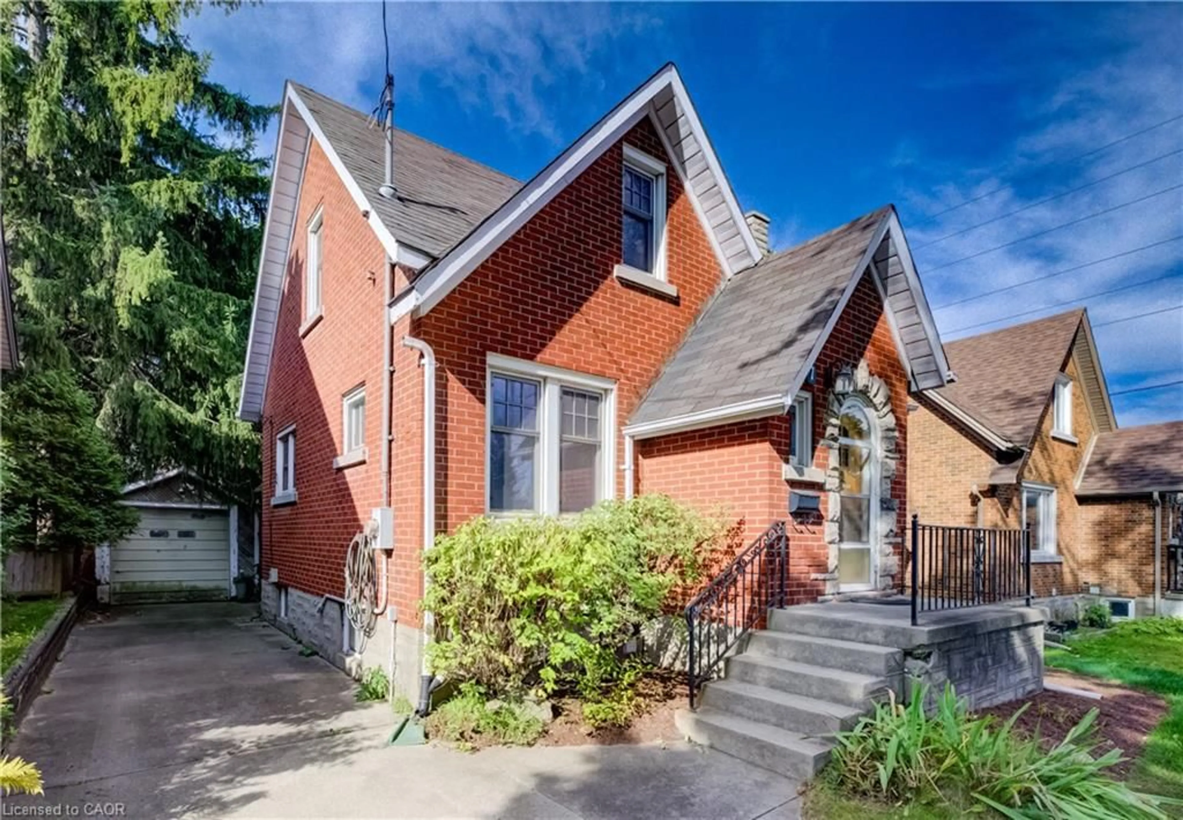 Home with brick exterior material, street for 7 Locust St, Kitchener Ontario N2H 1W6