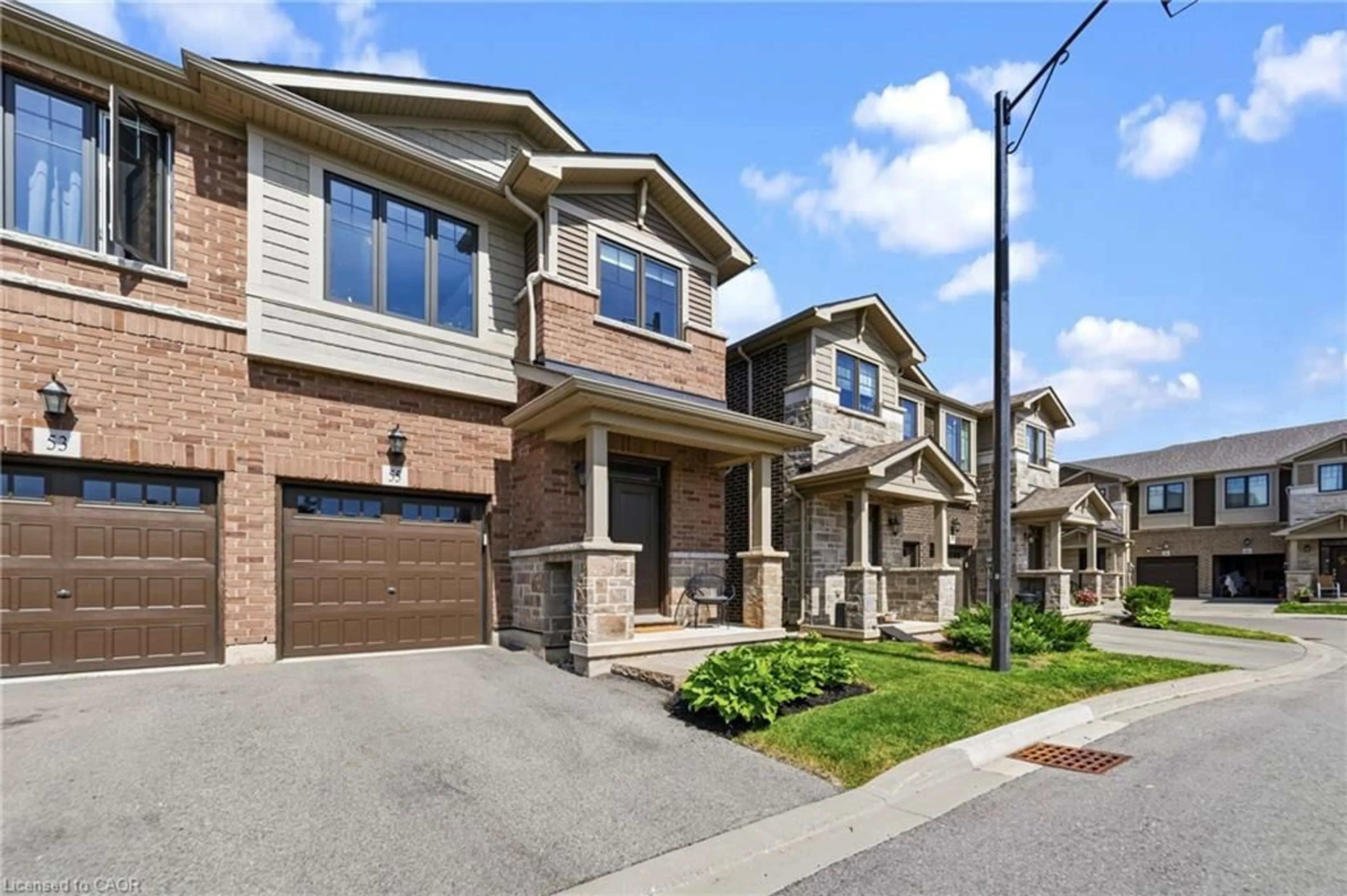 Home with brick exterior material, street for 55 Pelican Lane, Hamilton Ontario L8K 0A4