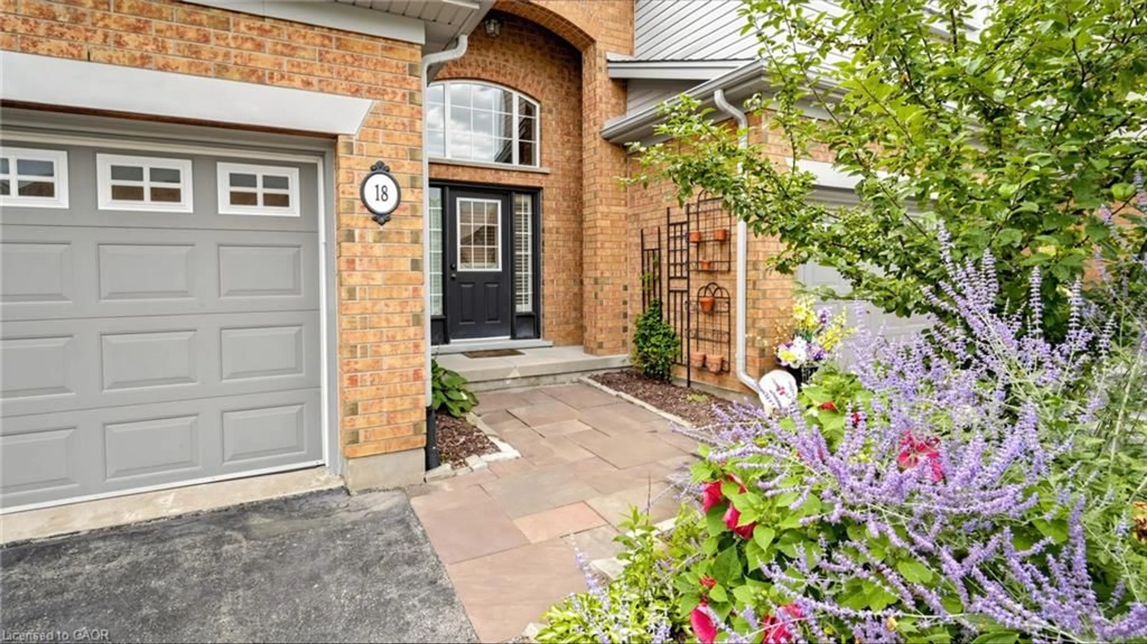 Home with brick exterior material, street for 18 Spencer Cres, Guelph Ontario N1L 1M2