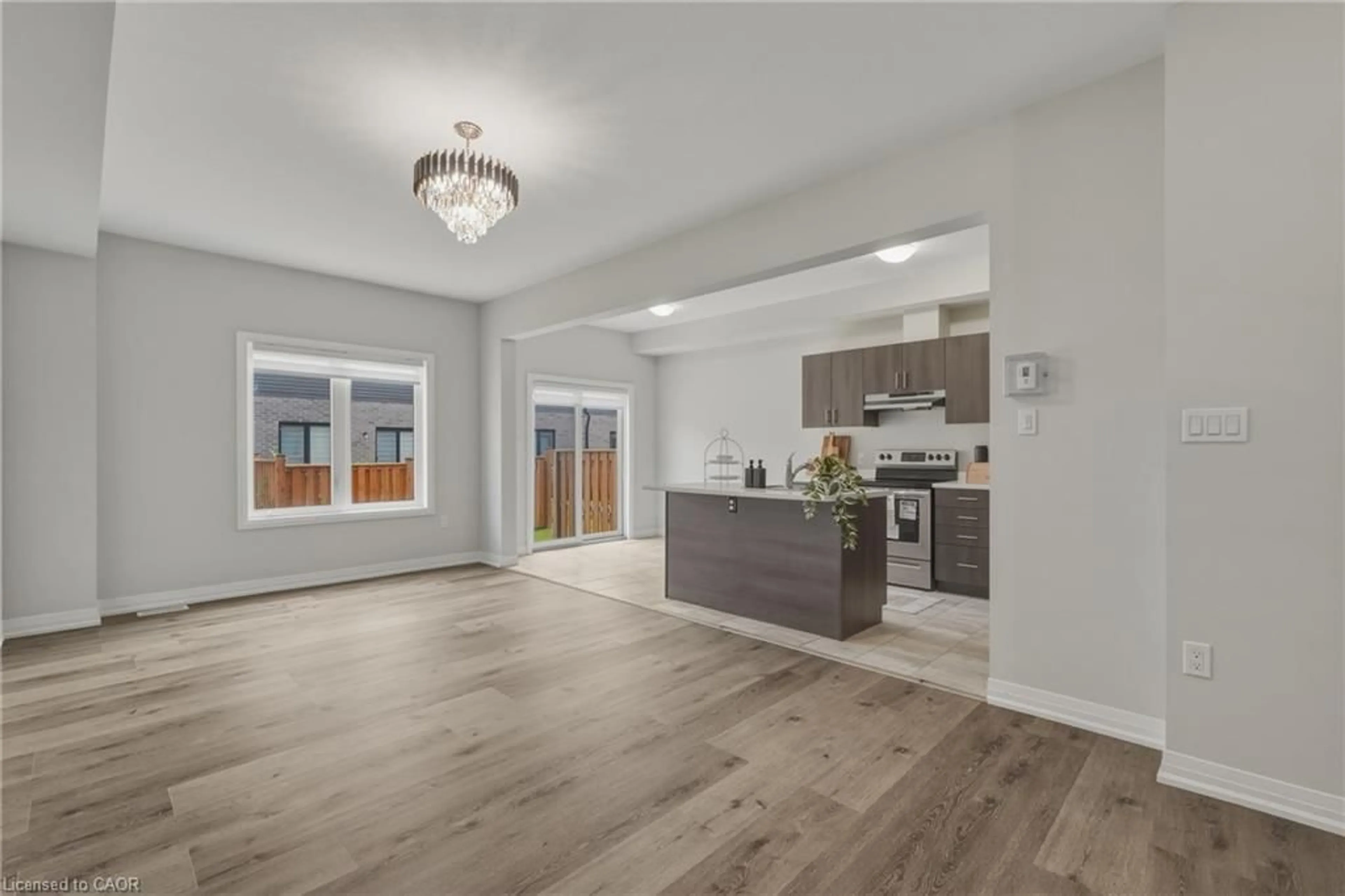 Open concept kitchen, wood/laminate floor for 520 Grey St #27, Brantford Ontario N3S 0K1