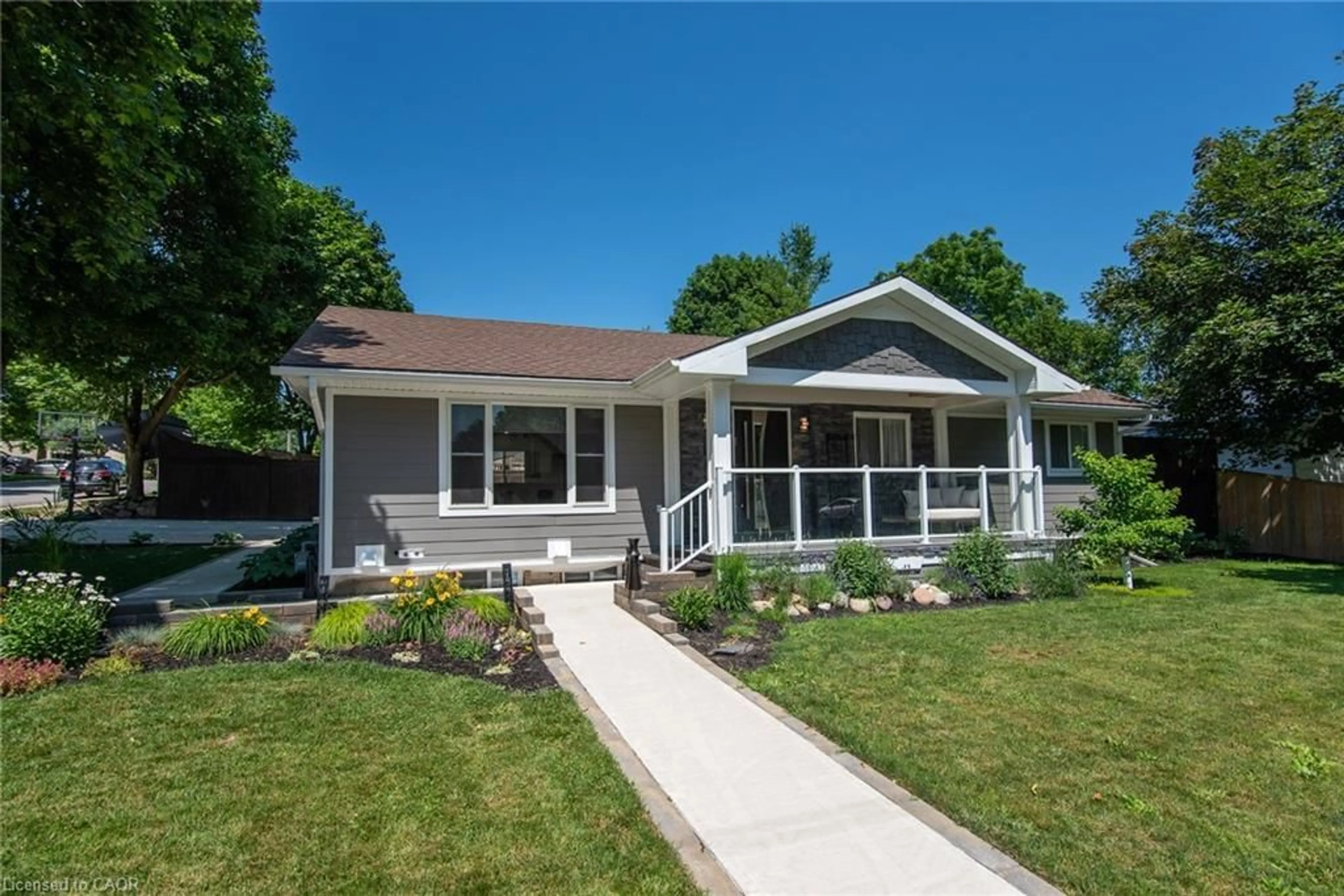 Home with vinyl exterior material, street for 99 John St, Wingham Ontario N0G 2W0