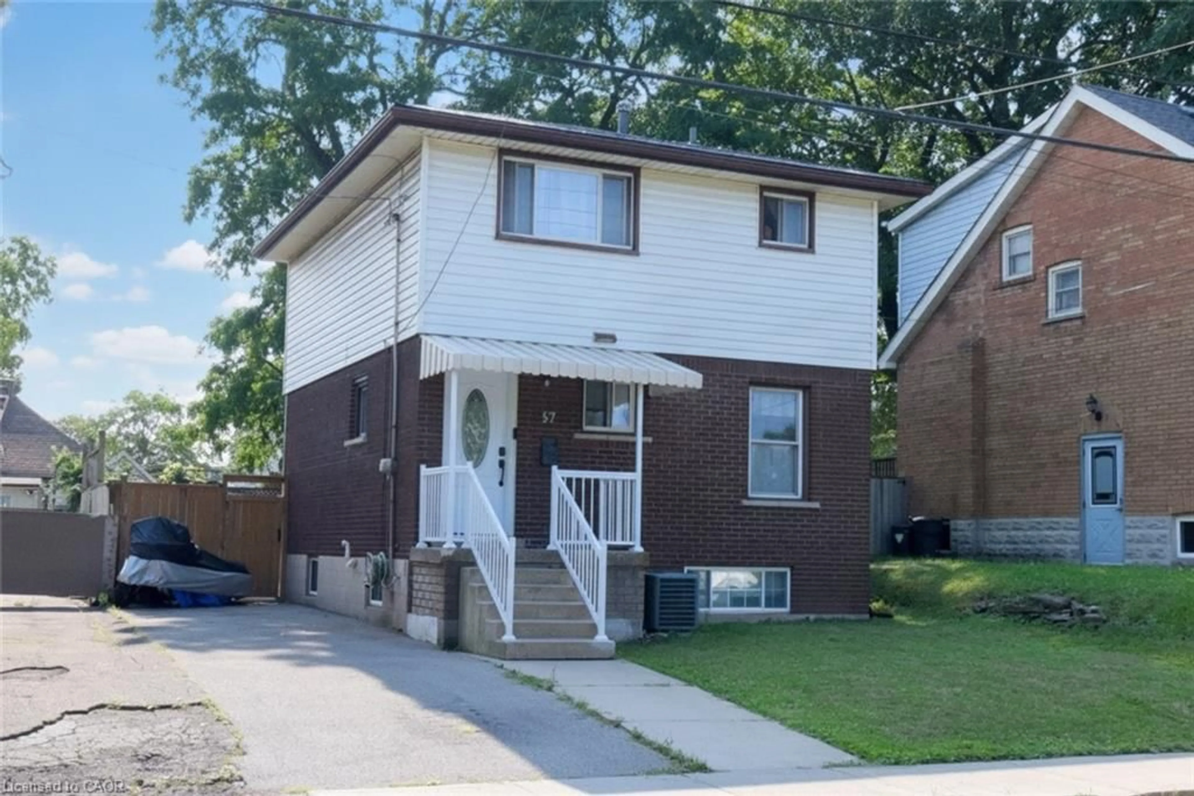 Home with brick exterior material, street for 57 East 31st St, Hamilton Ontario L8V 3N8