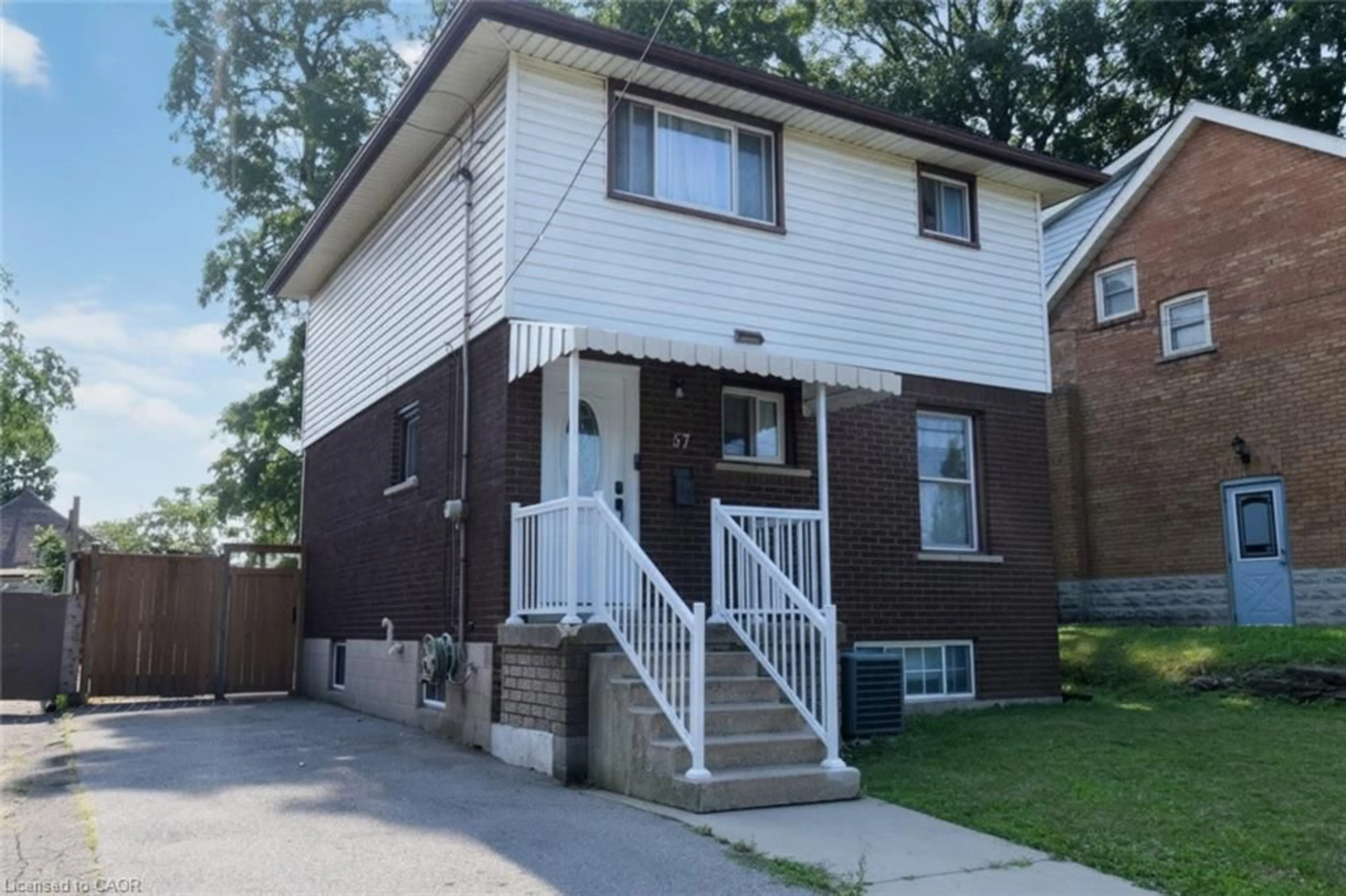 Home with brick exterior material, street for 57 East 31st St, Hamilton Ontario L8V 3N8