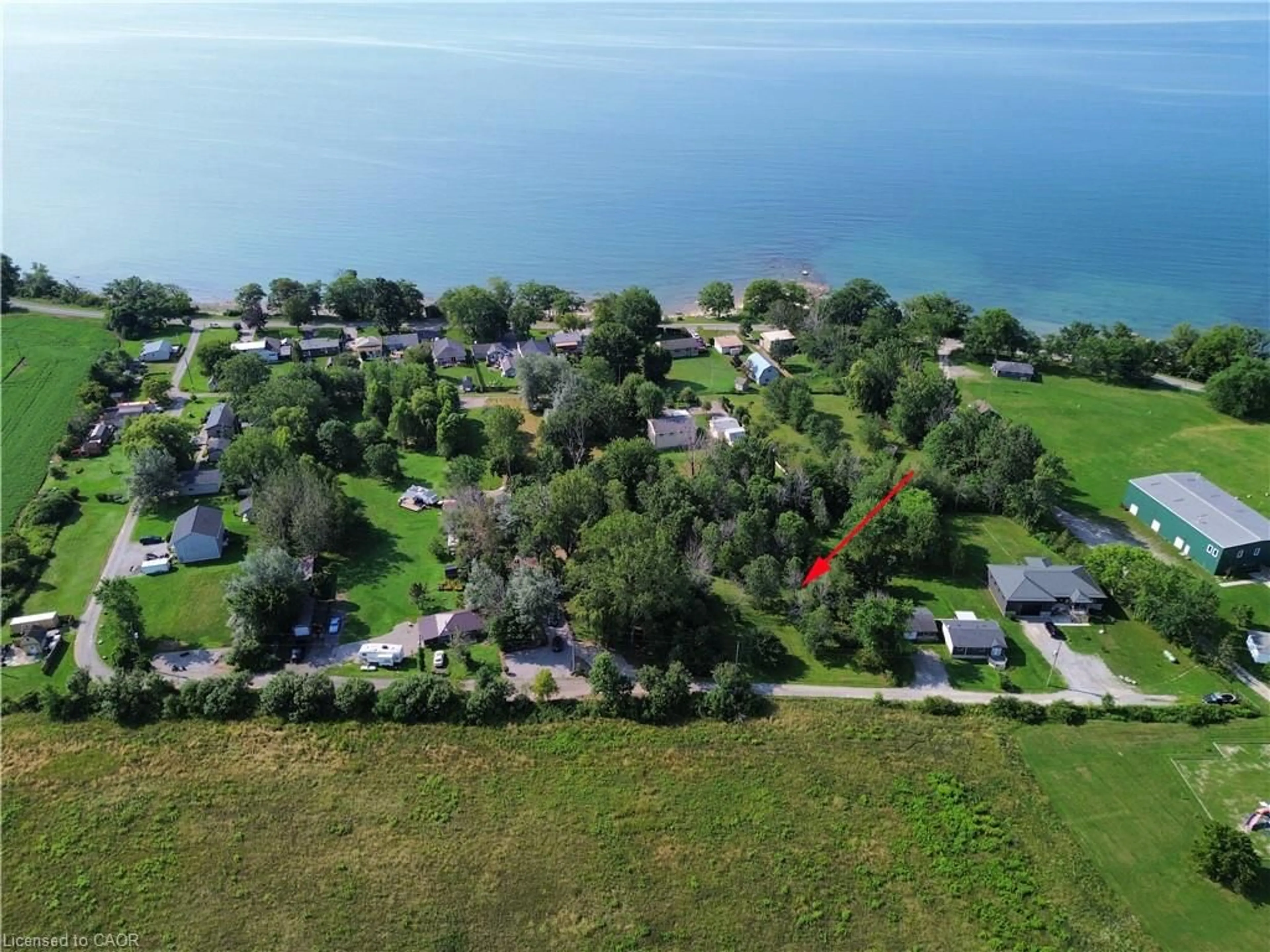 A pic from outside/outdoor area/front of a property/back of a property/a pic from drone, water/lake/river/ocean view for 10 Humming Bird Lane, Selkirk Ontario N0A 1P0