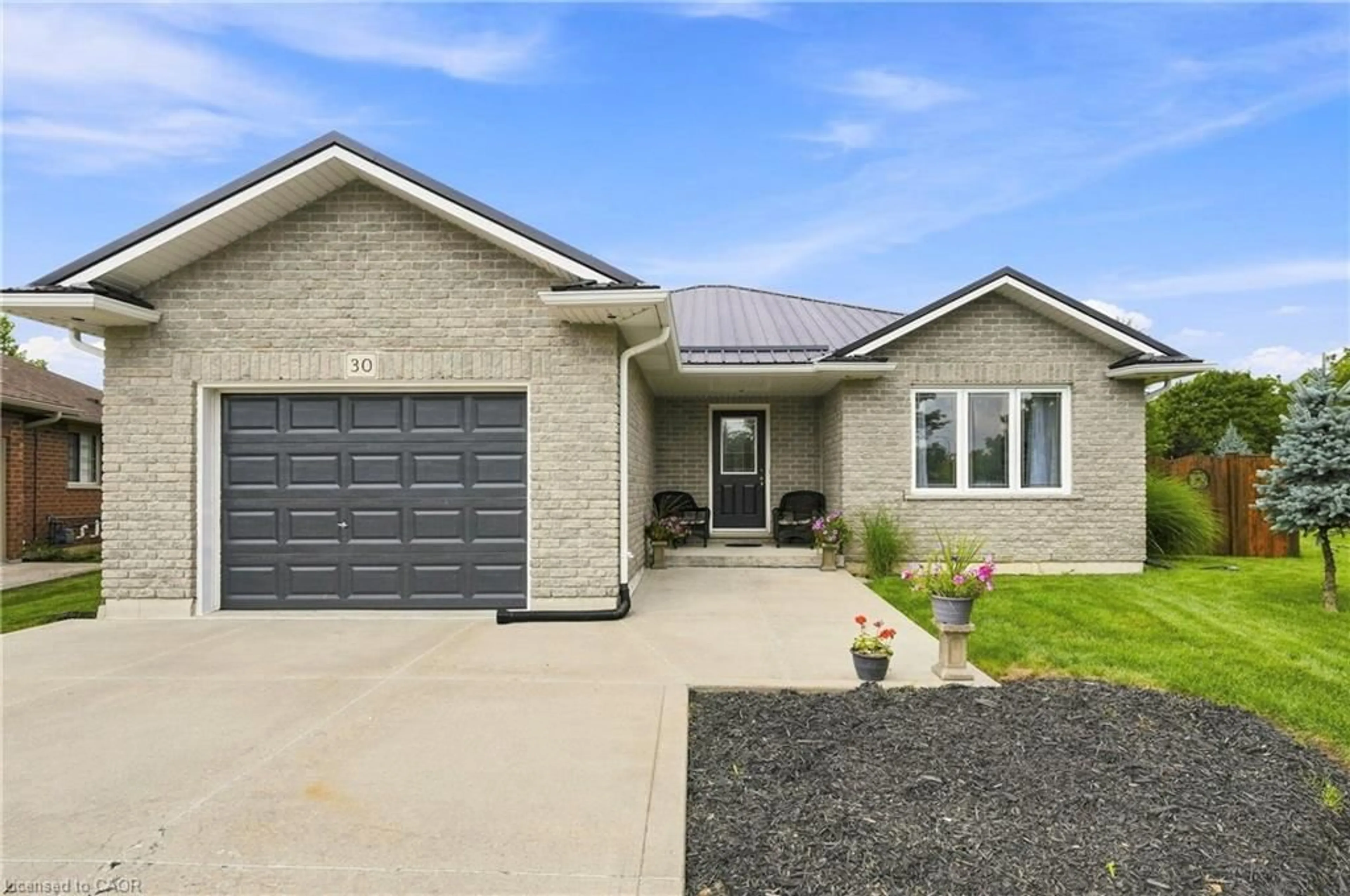 Home with brick exterior material, street for 30 Leslie St, Jarvis Ontario N0A 1J0