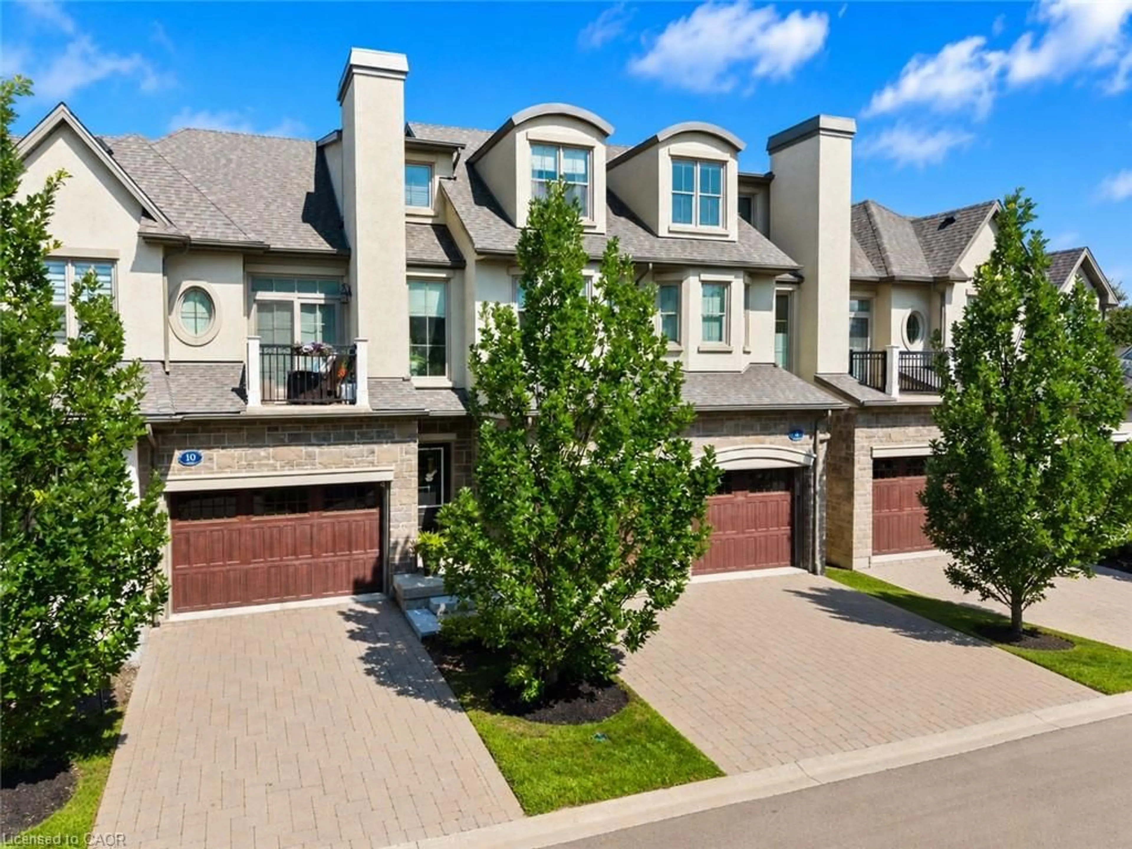 Home with brick exterior material, street for 8 St. Andrews Lane, Niagara-on-the-Lake Ontario L0S 1J0