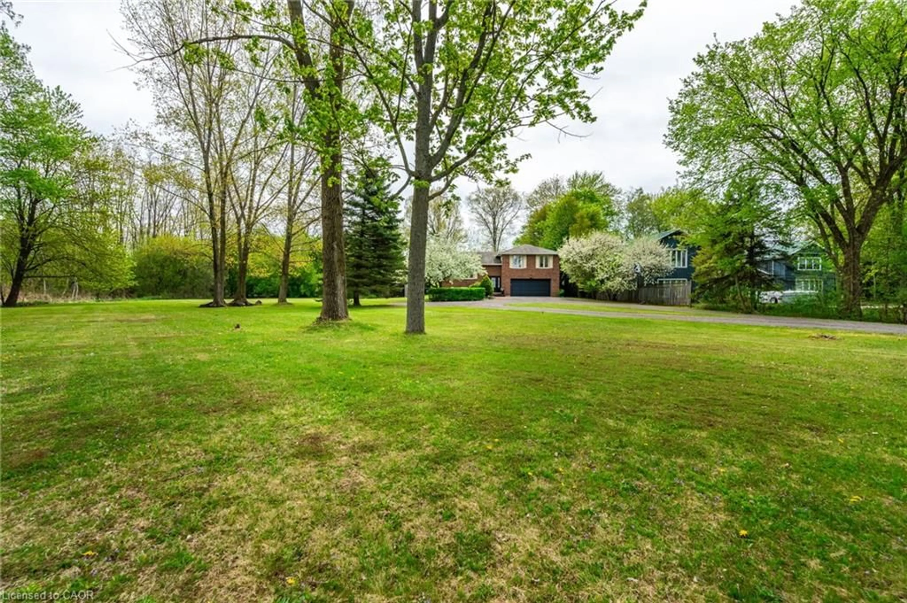 A pic from outside/outdoor area/front of a property/back of a property/a pic from drone, forest/trees view for 152 Concession 7 Rd, Millgrove Ontario L0R 1V0