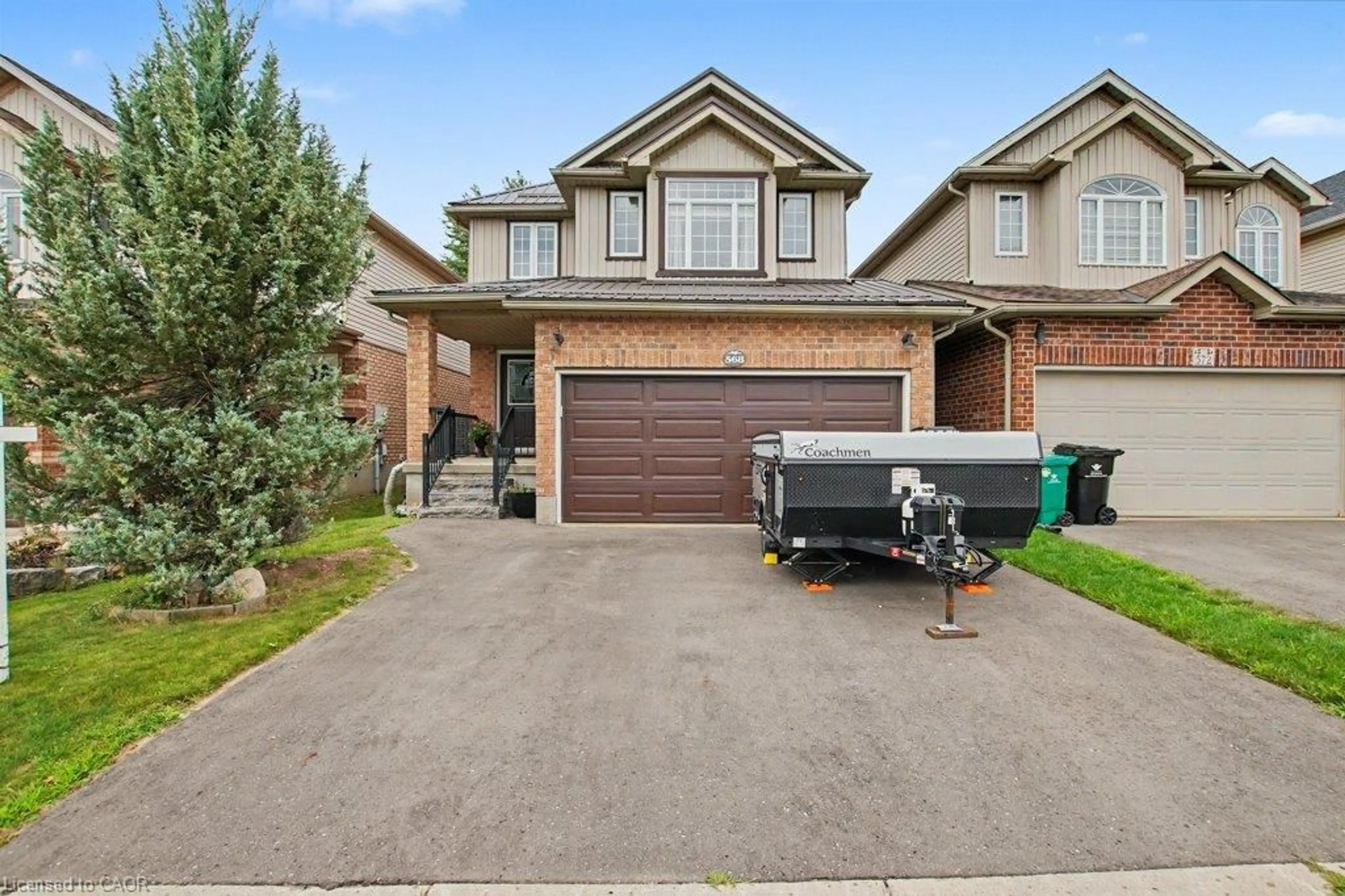 Home with brick exterior material, street for 568 Robert Ferrie Dr, Kitchener Ontario N2P 2T8