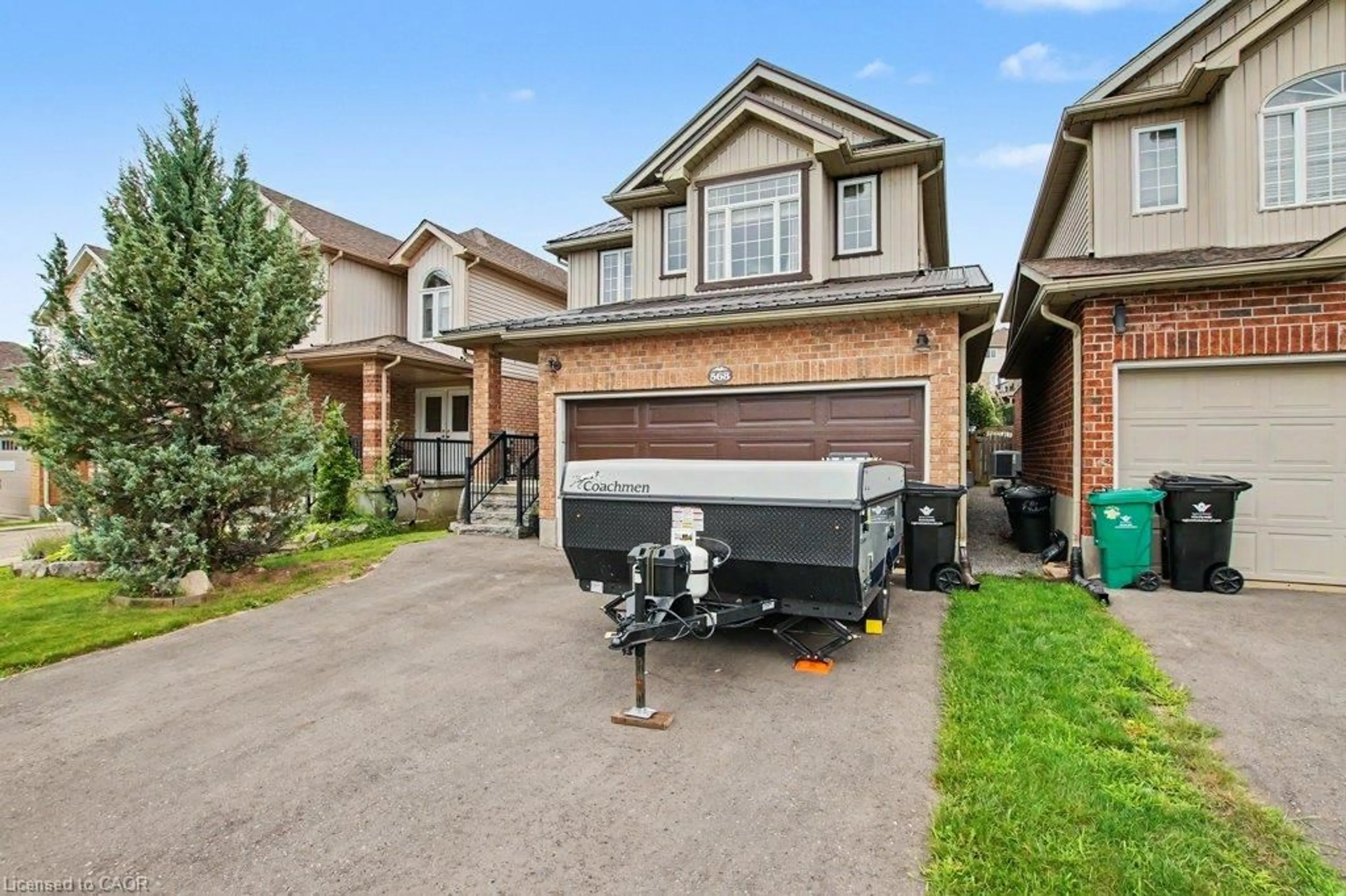 Home with brick exterior material, street for 568 Robert Ferrie Dr, Kitchener Ontario N2P 2T8
