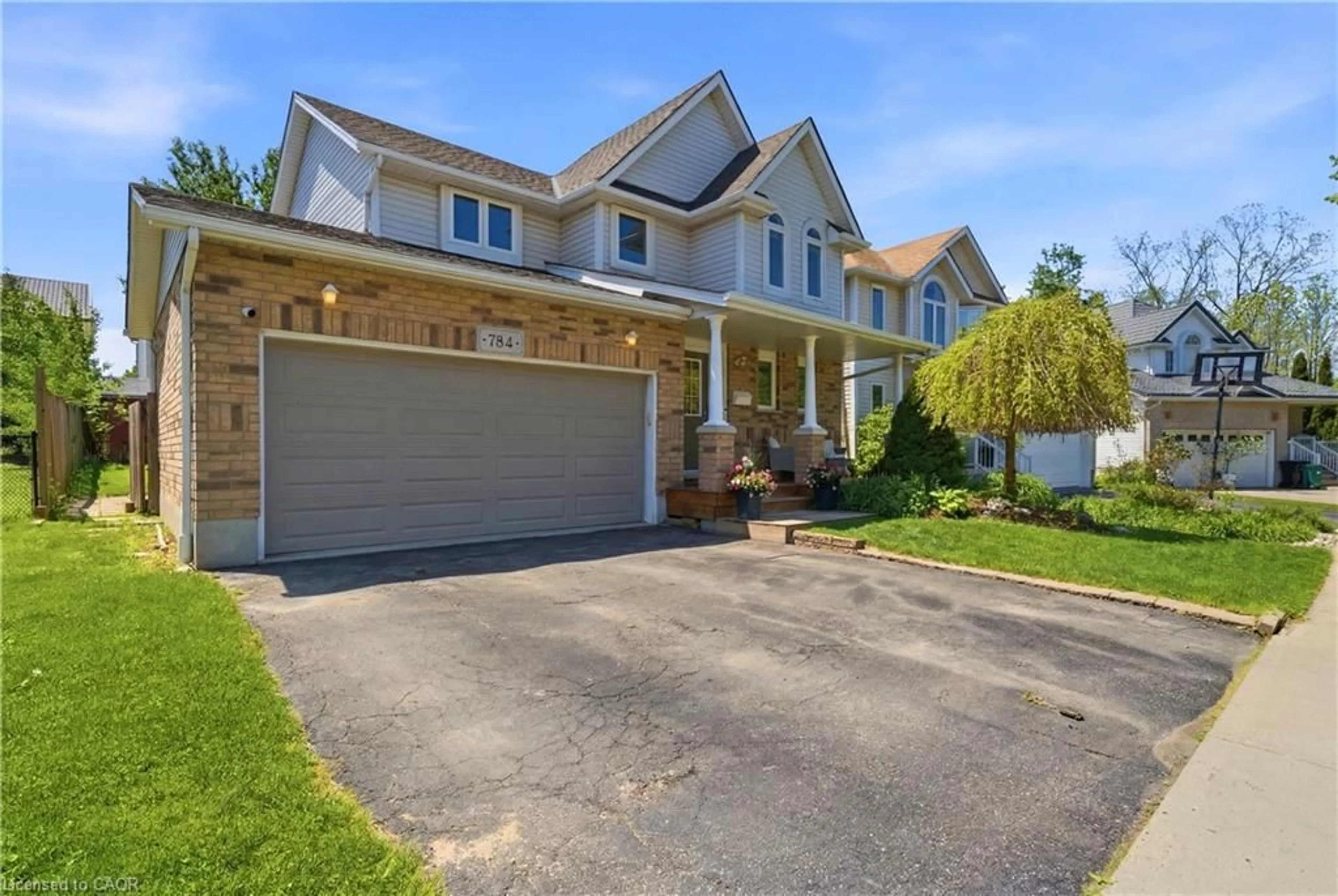 Home with brick exterior material, street for 784 Butternut Ave, Waterloo Ontario N2V 2M3