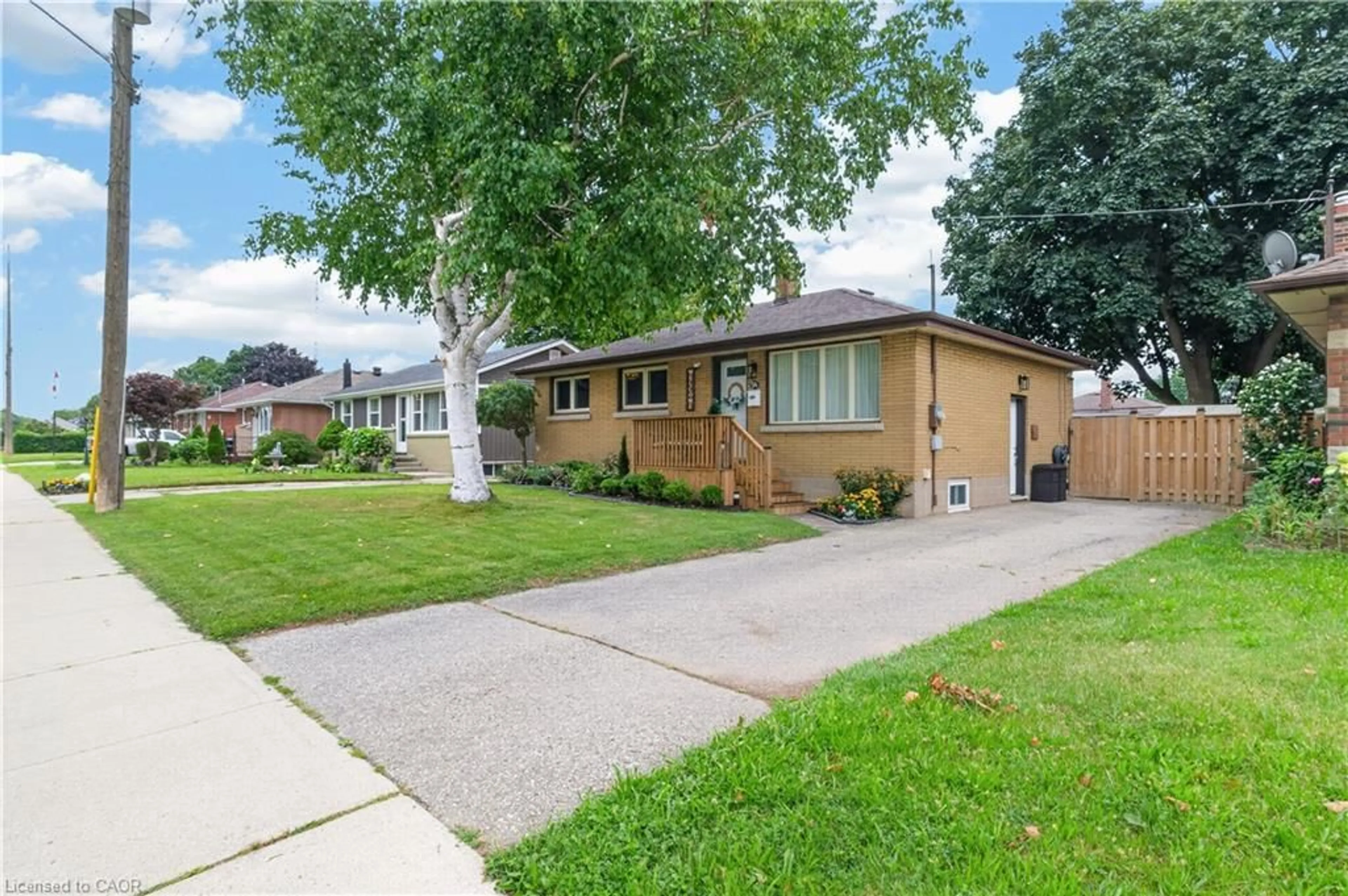 Home with brick exterior material, street for 94 Ninth Ave, Brantford Ontario N3S 1E5
