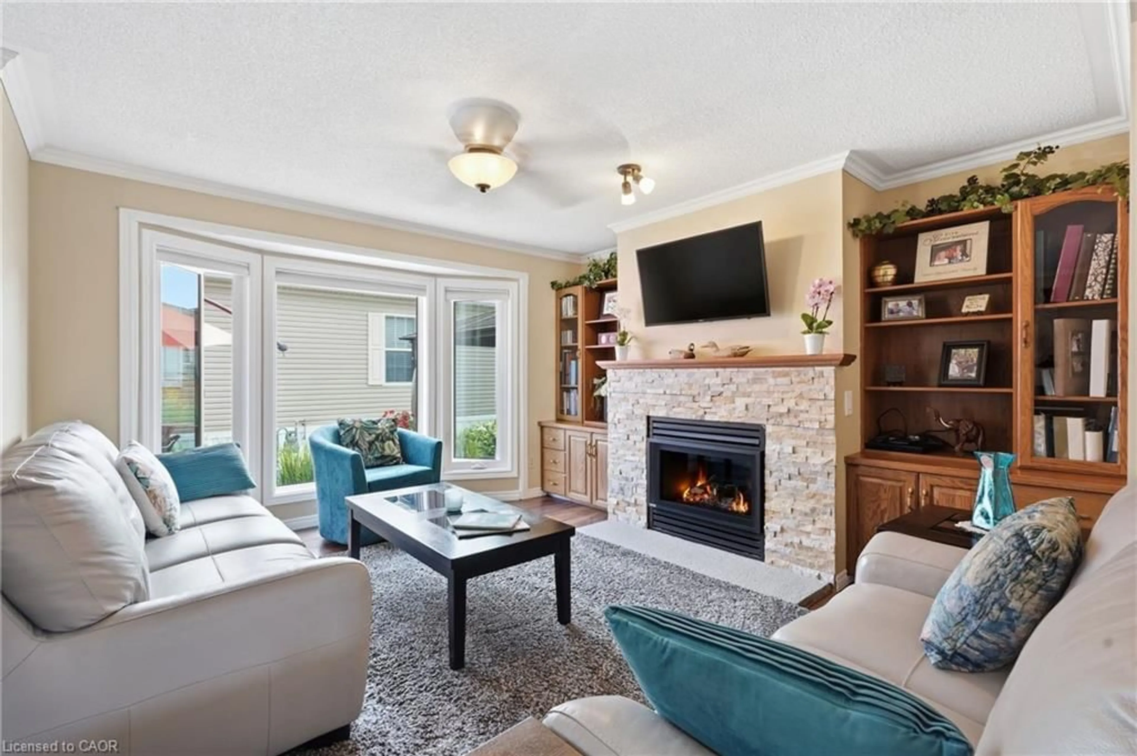 Living room with furniture, ceramic/tile floor for 9 Basswood Rd, Puslinch Ontario N0B 2J0