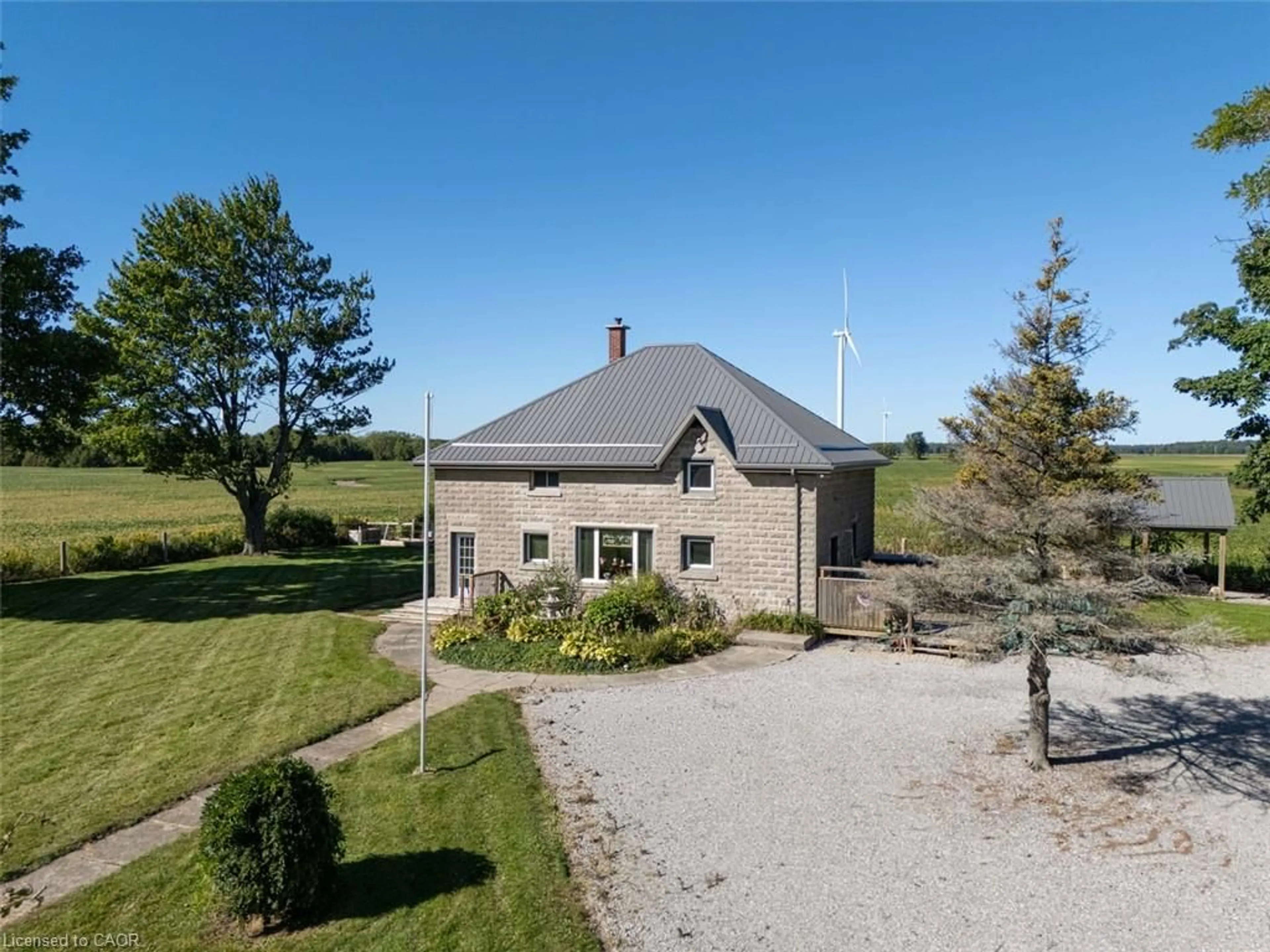 A pic from outside/outdoor area/front of a property/back of a property/a pic from drone, unknown for 1635 Lakeshore Rd, Clear Creek Ontario N0E 1M0