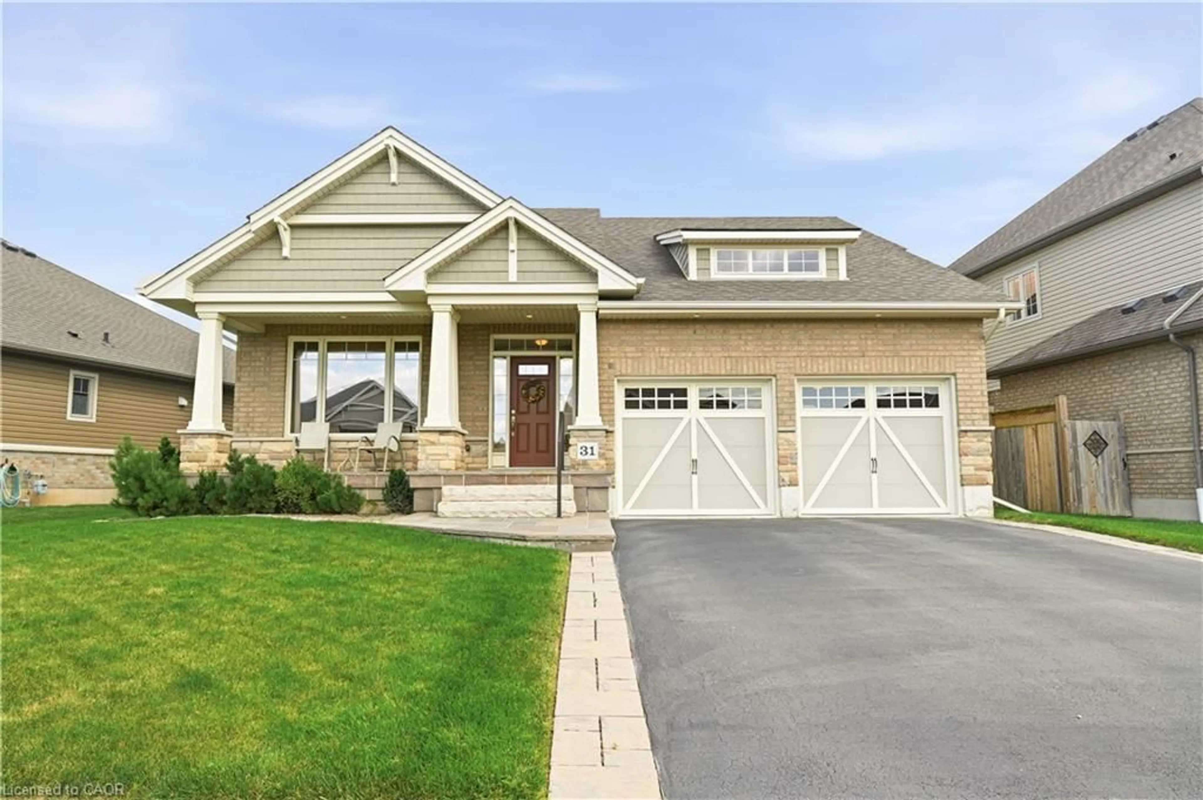 Home with vinyl exterior material, street for 31 Streamside Dr, Smithville Ontario L0R 2A0