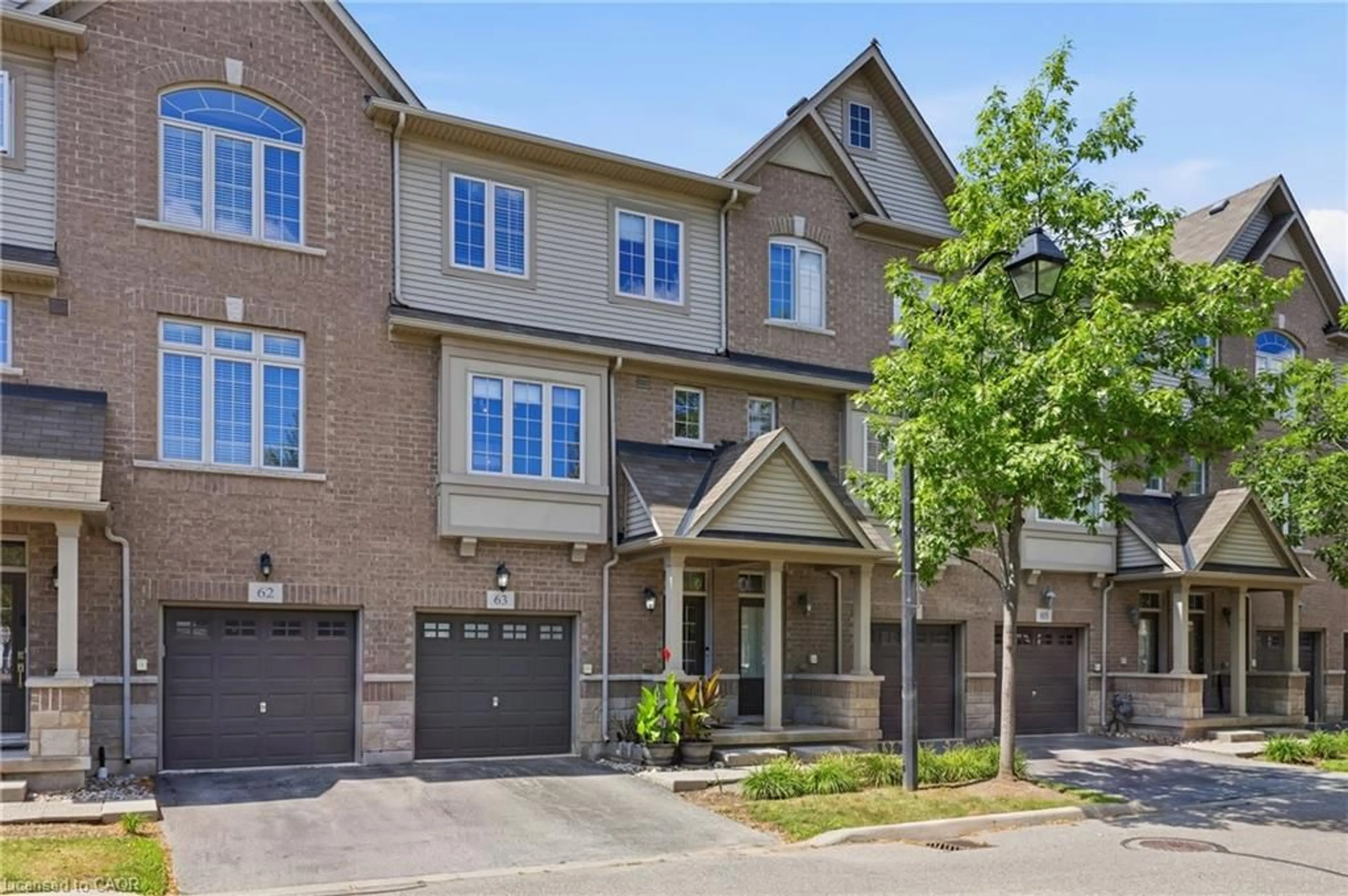 Home with brick exterior material, street for 1401 Plains Rd #63, Burlington Ontario L7R 0C2