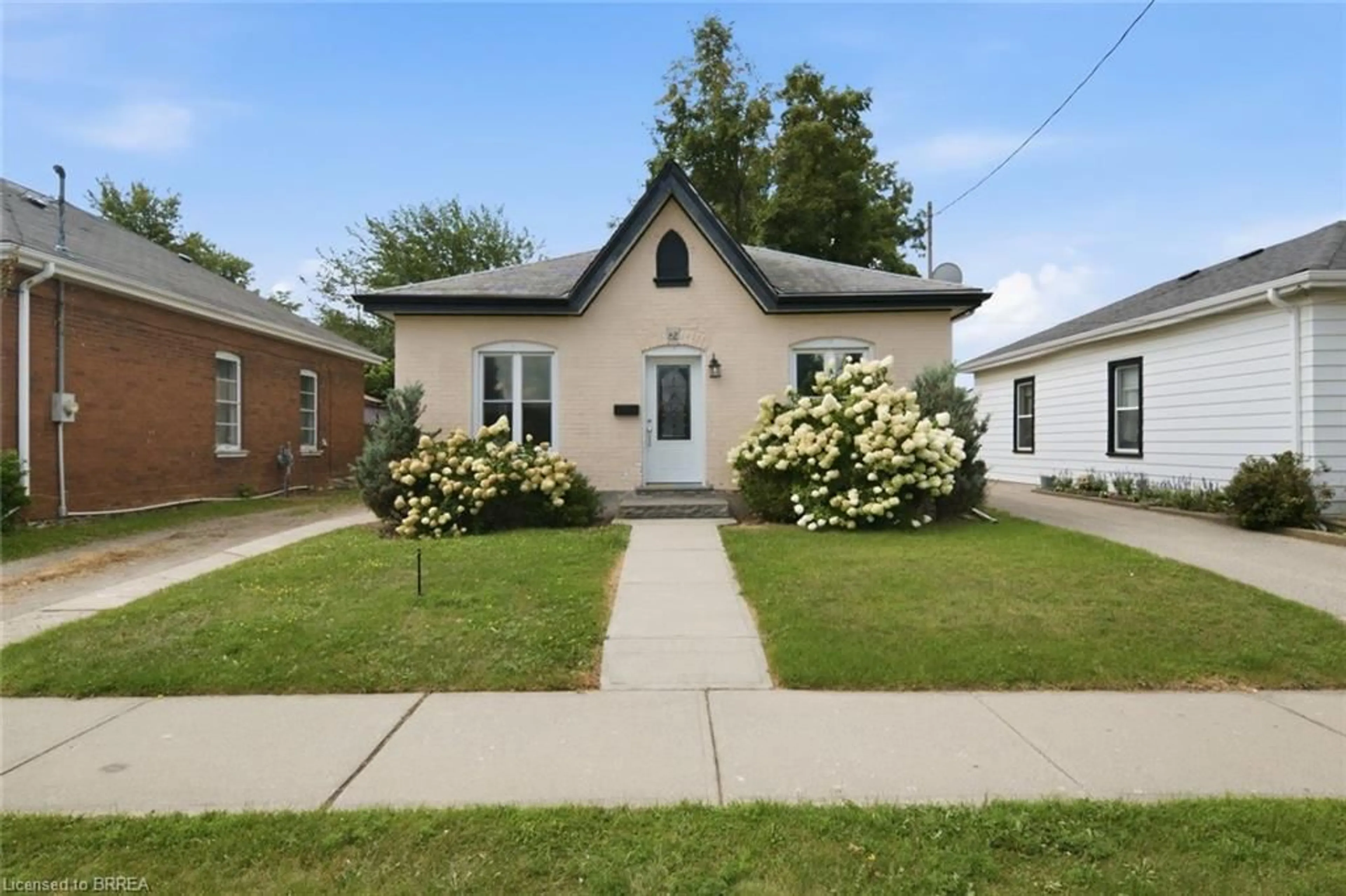 Home with brick exterior material, street for 82 St. George St, Brantford Ontario N3R 1V4