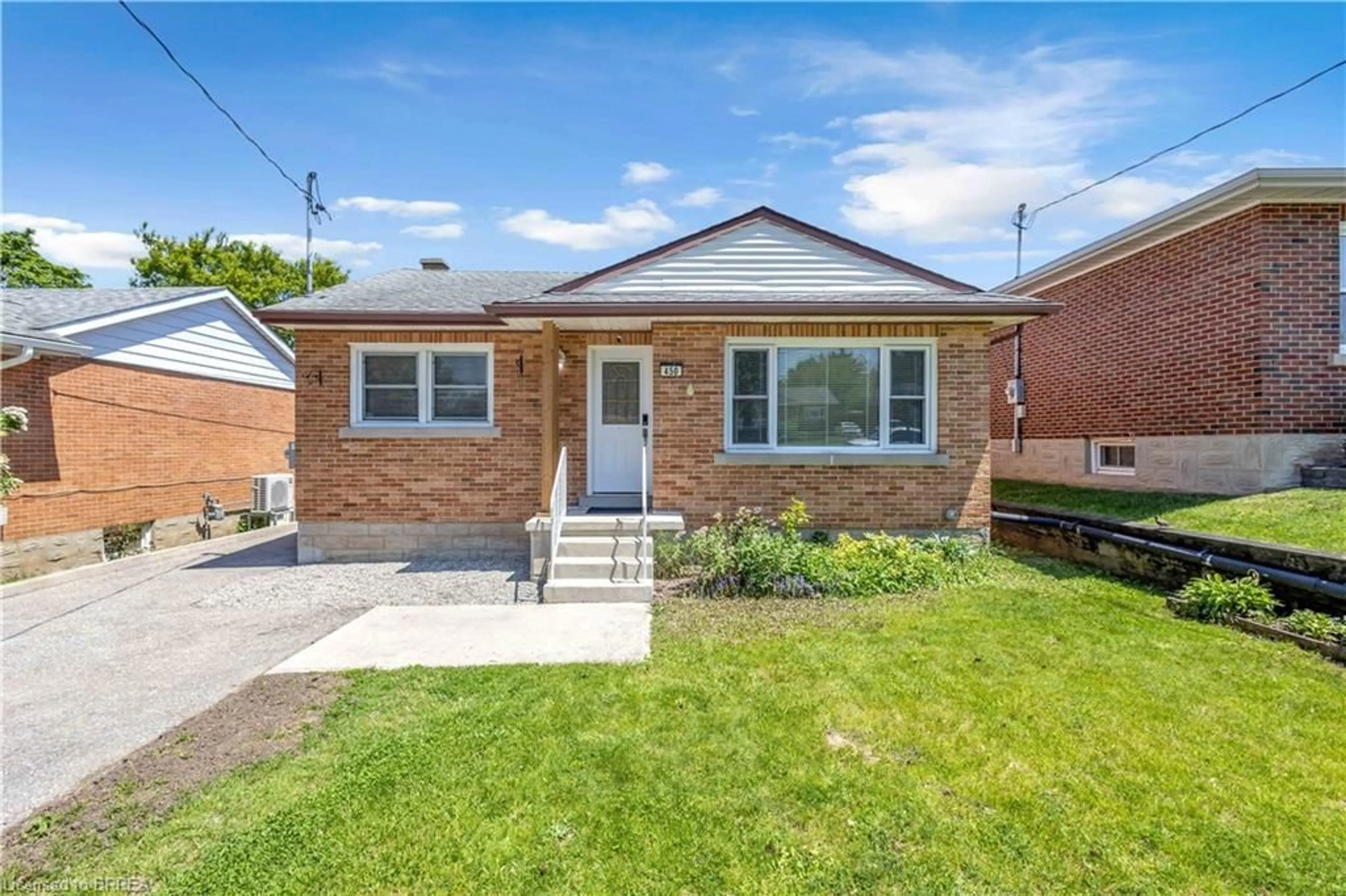 Home with brick exterior material, street for 450 Highland Rd, Kitchener Ontario N2M 3W7