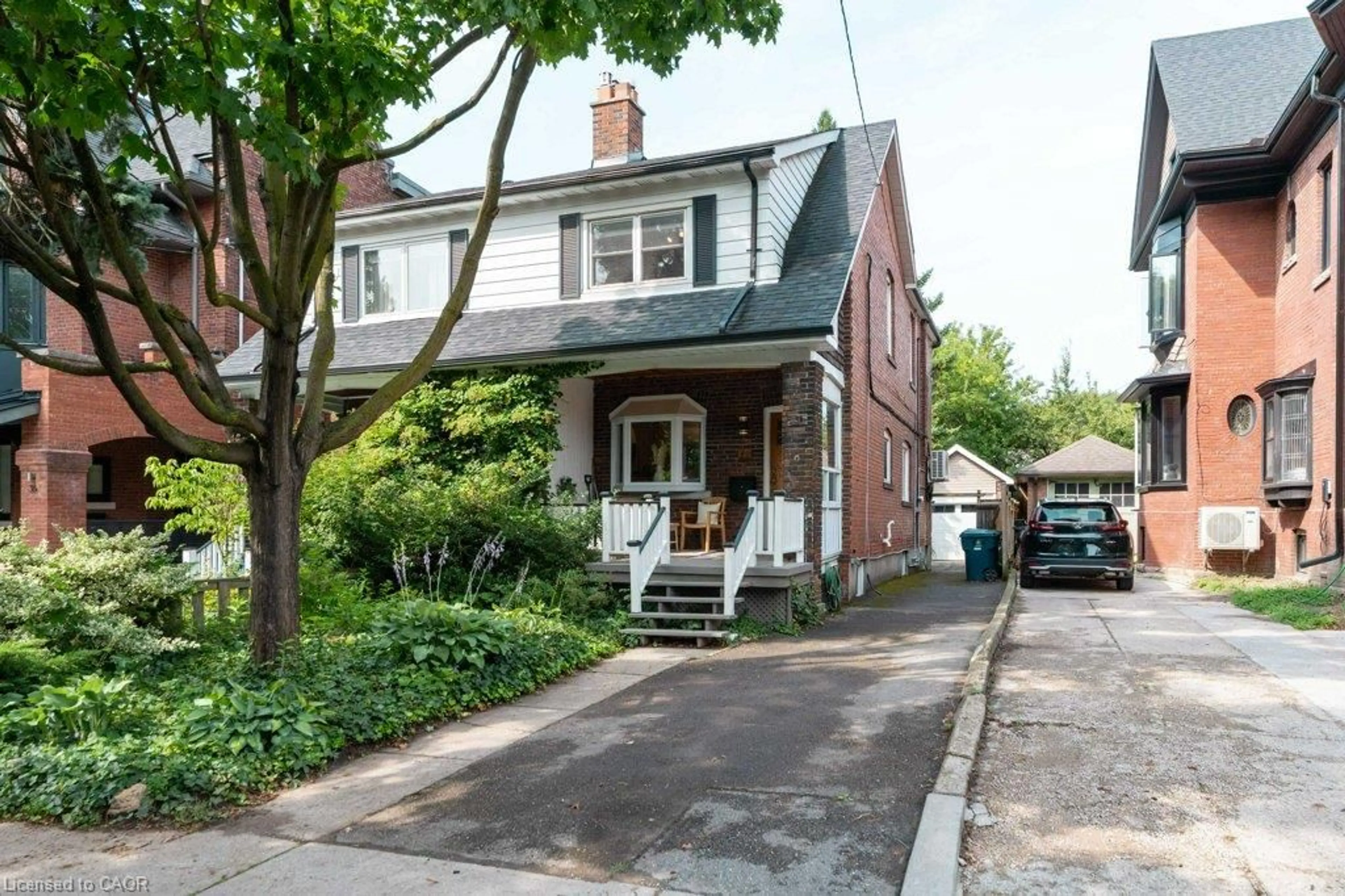 Home with brick exterior material, street for 40 Delaware Ave, Toronto Ontario M6H 2S7