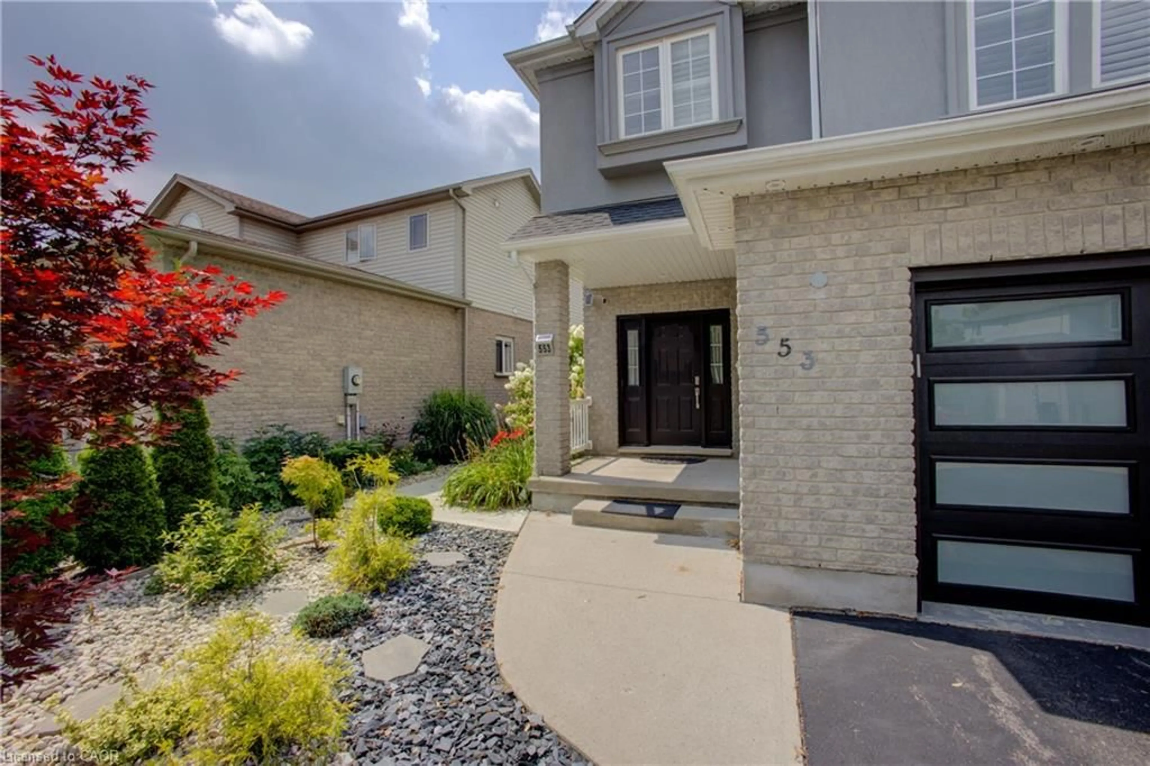 Home with brick exterior material, street for 553 Waterton Dr, Waterloo Ontario N2V 2K5
