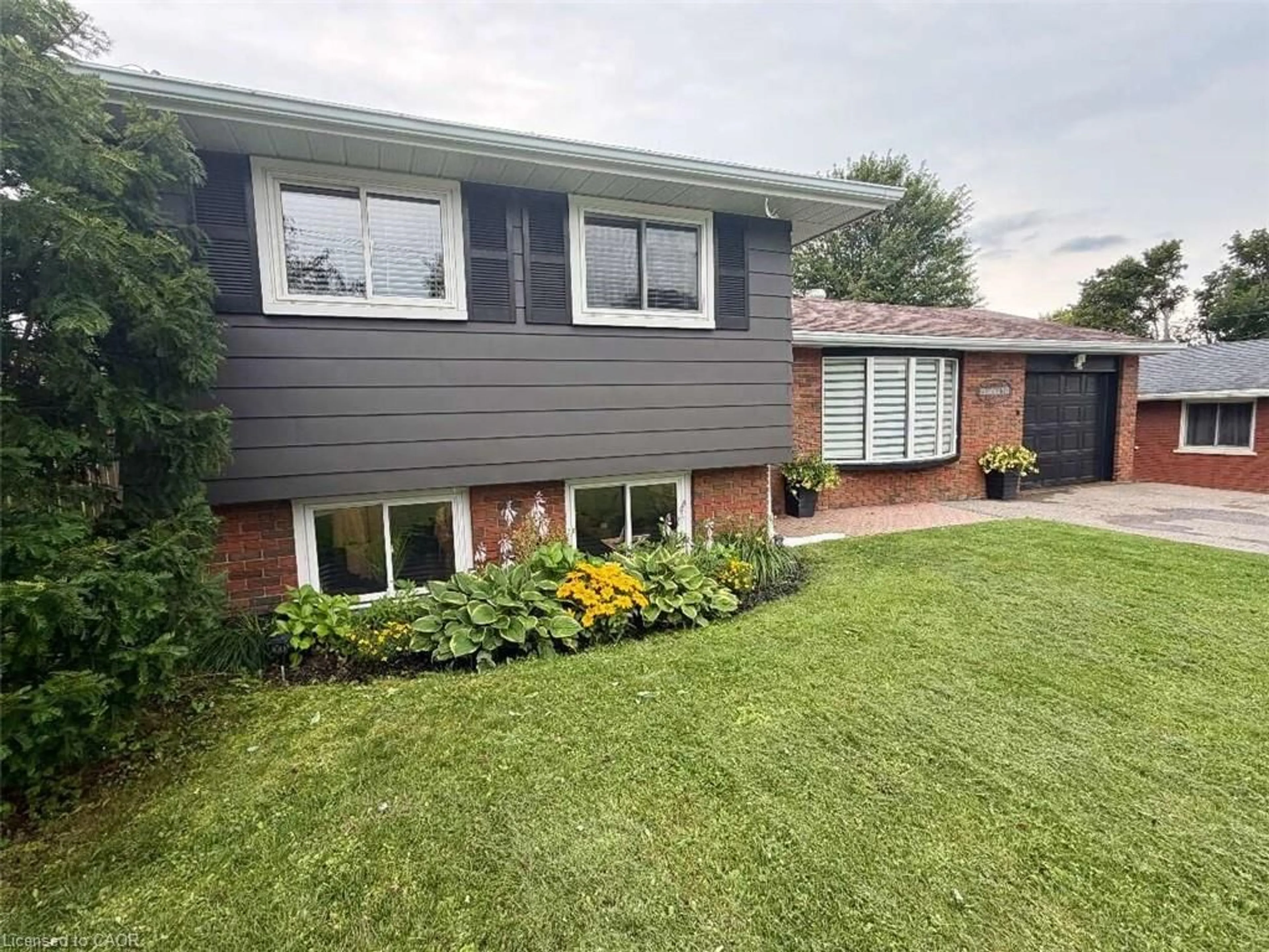 Home with brick exterior material, street for 630 Manly St, Midland Ontario L4R 3G5