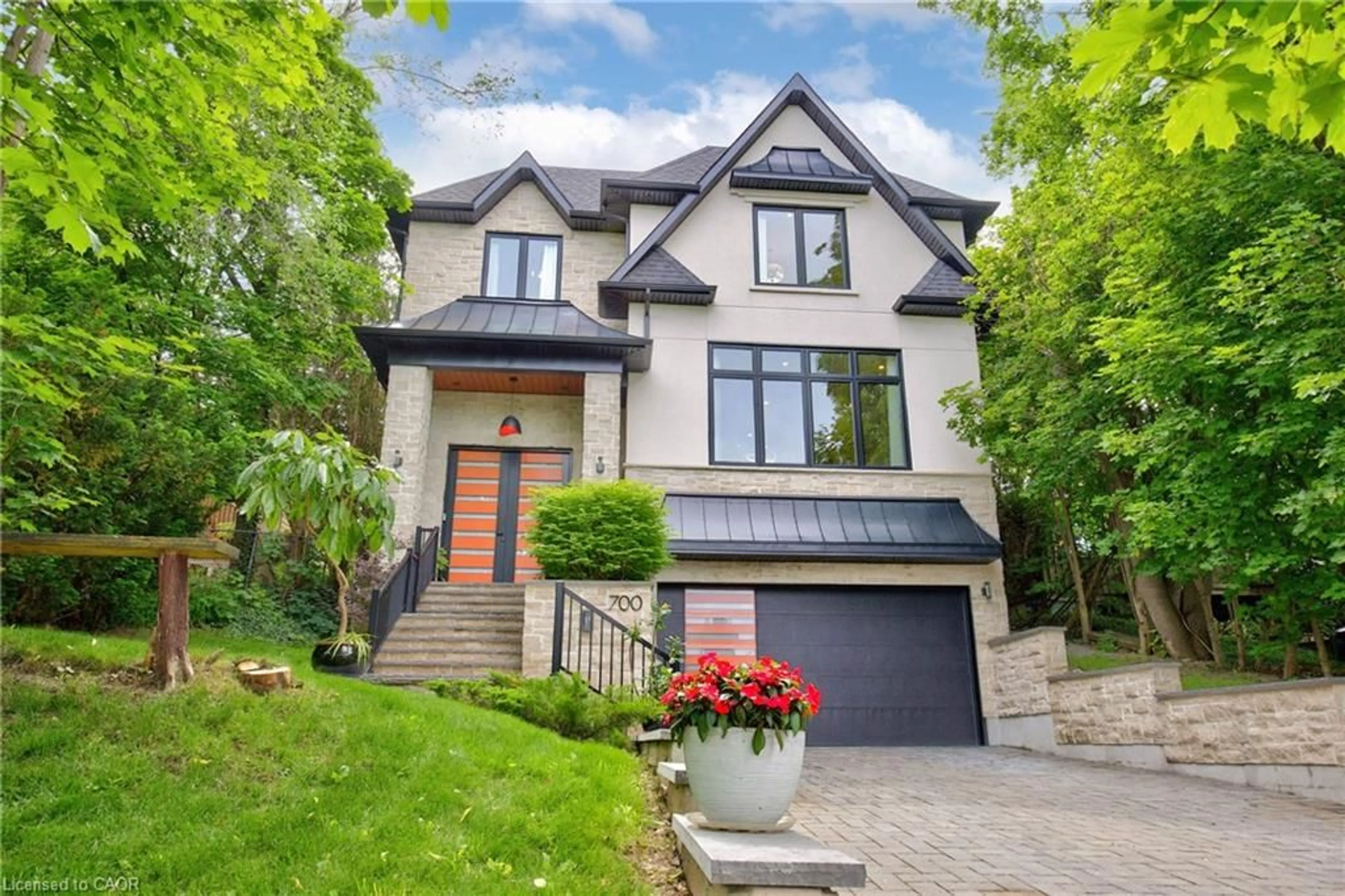 Home with brick exterior material, street for 700 Hillcrest Rd, West Shore Ontario L1W 2P1