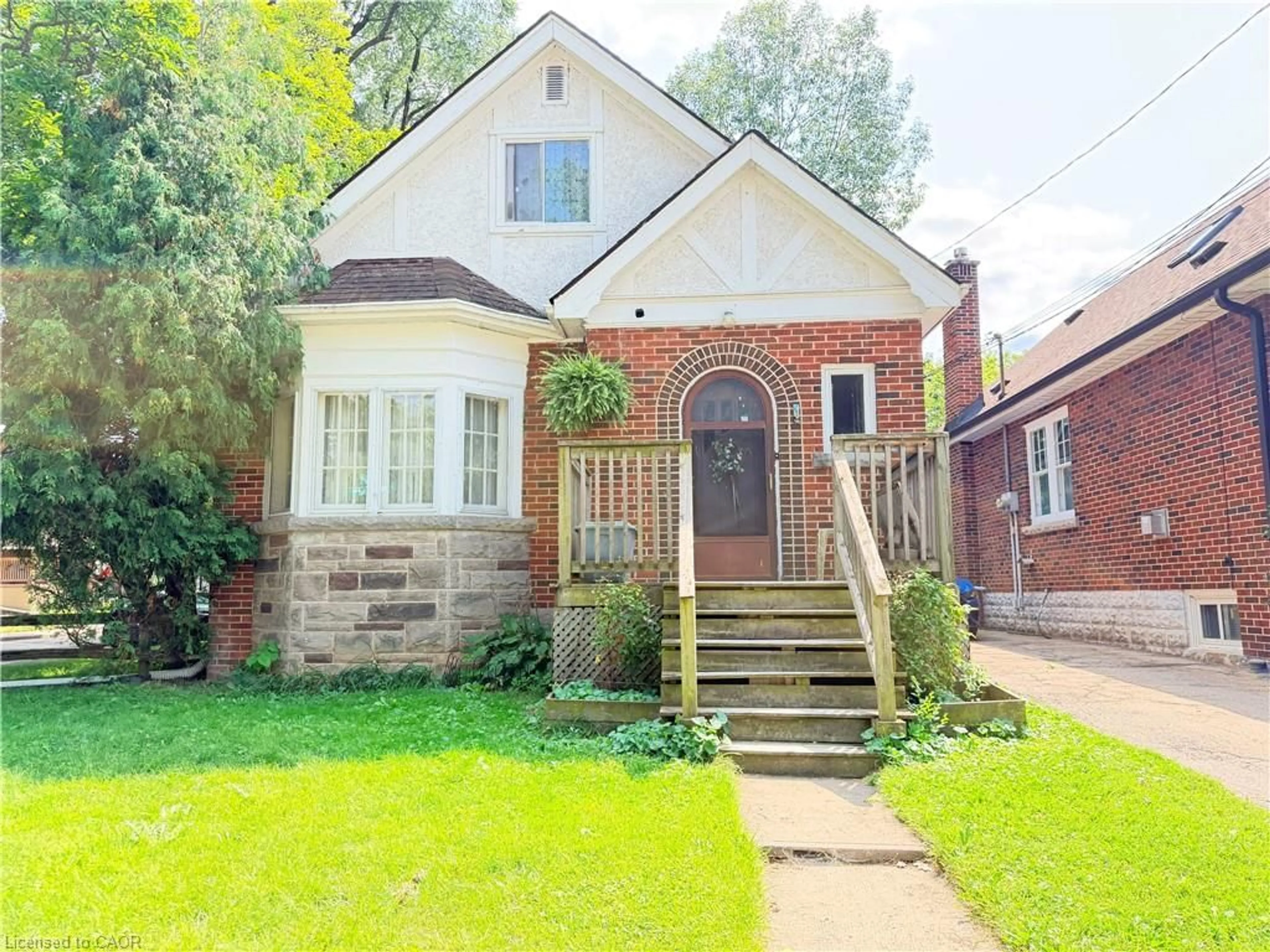 Home with brick exterior material, street for 1 Norwood Rd, Hamilton Ontario L8S 3P8