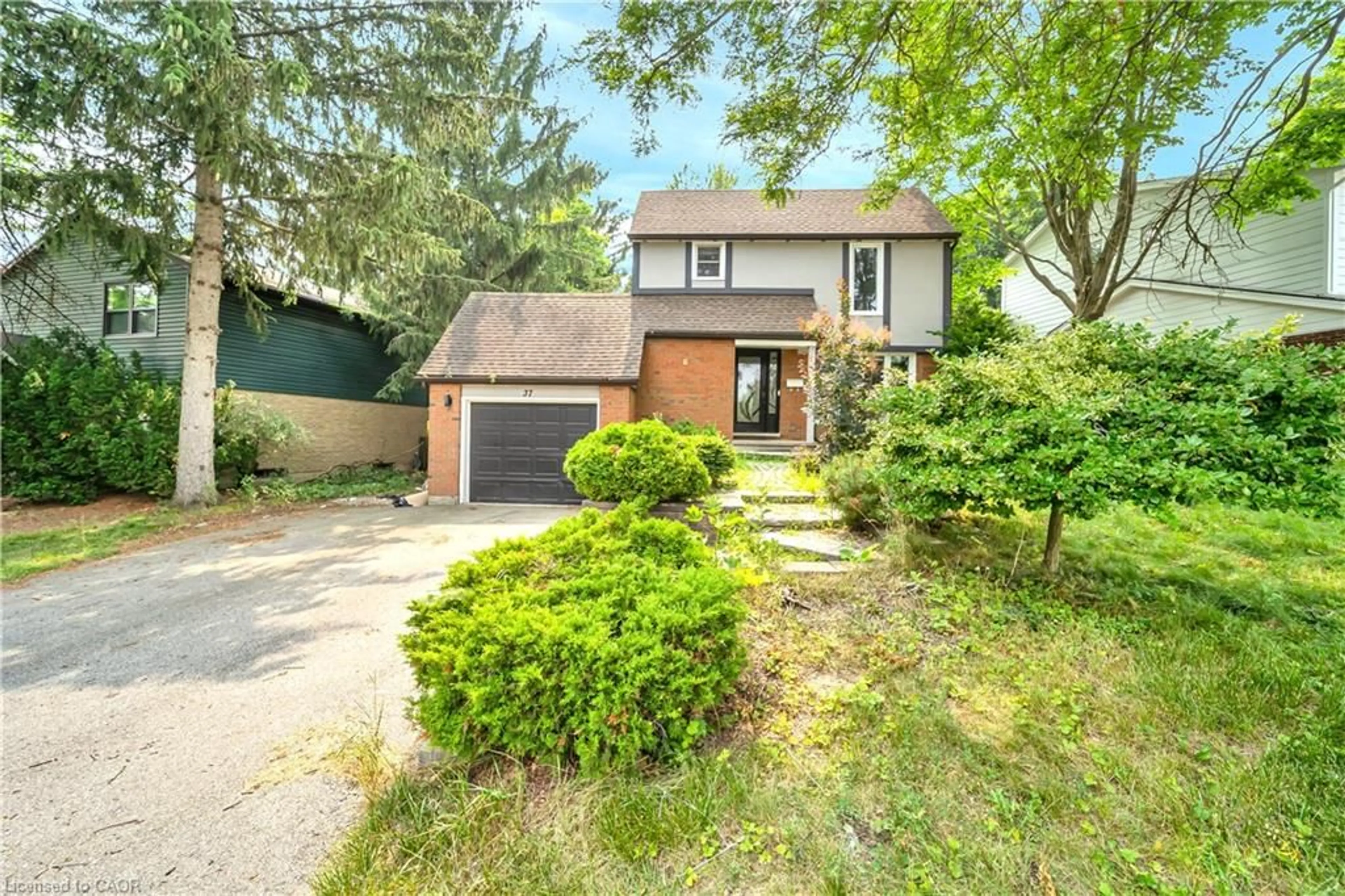 Home with brick exterior material, street for 37 Ferman Dr, Guelph Ontario N1H 7C9