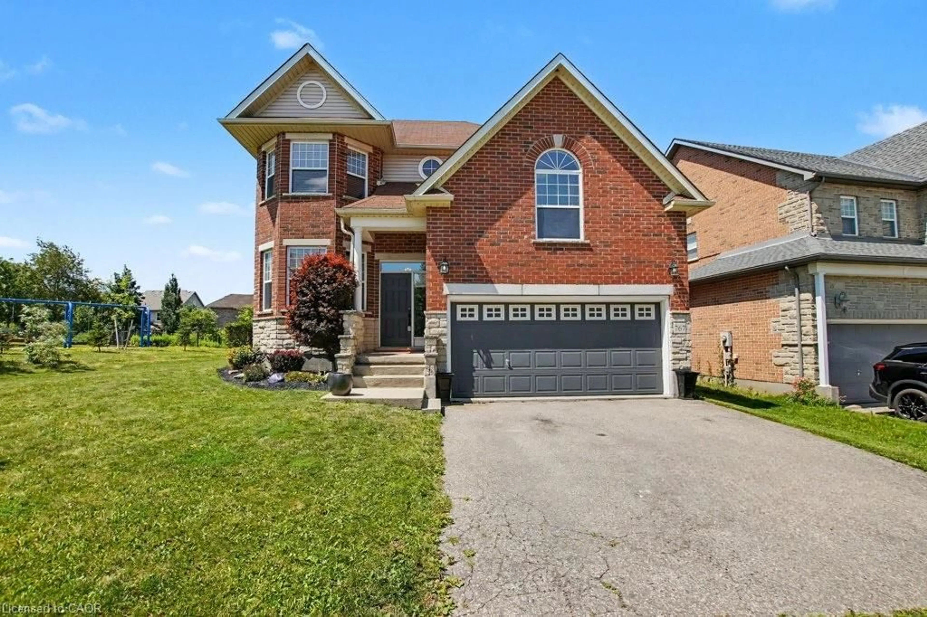 Home with brick exterior material, street for 767 Lucerne Ave, Waterloo Ontario N2T 2Y3