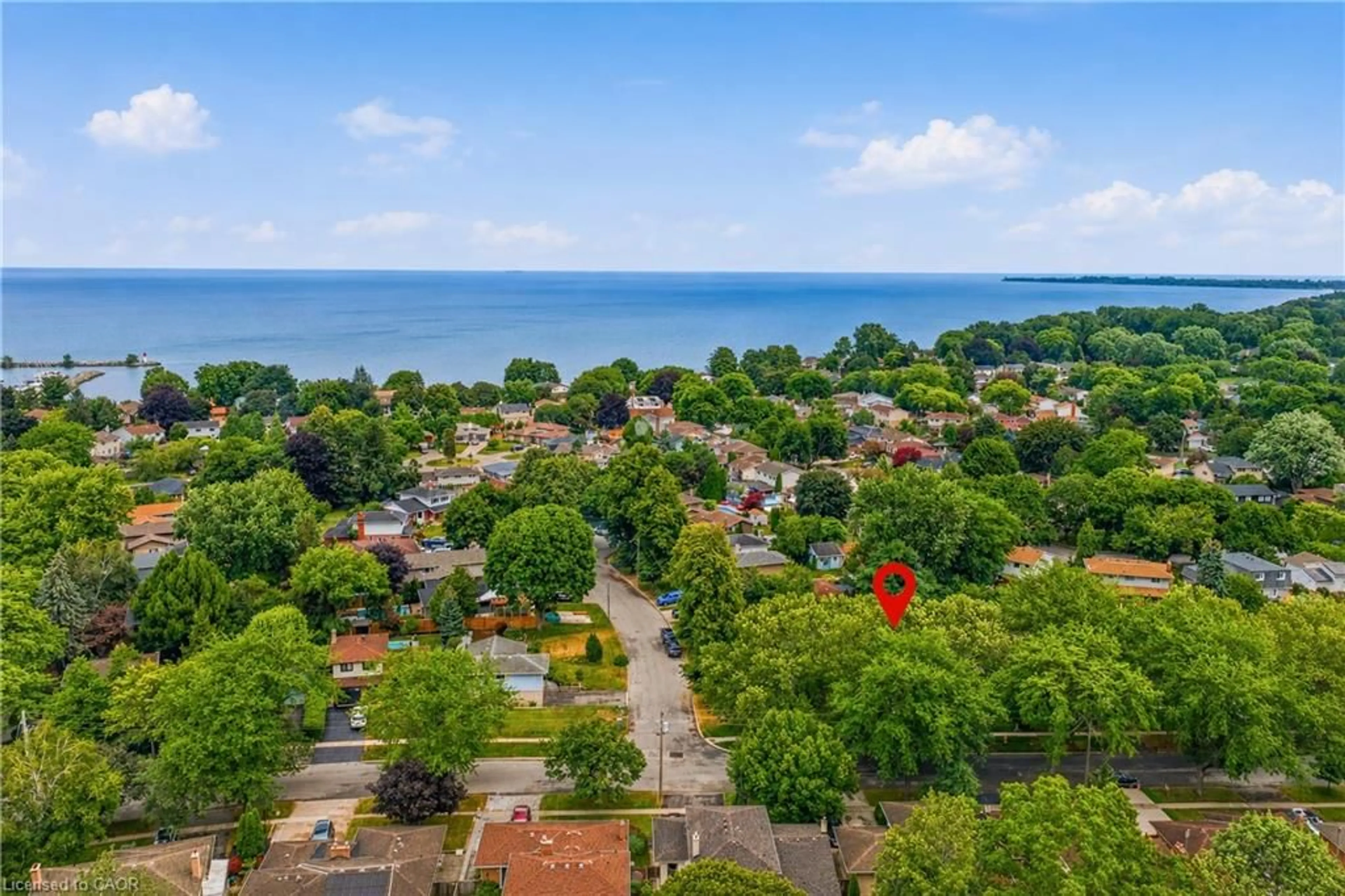 A pic from outside/outdoor area/front of a property/back of a property/a pic from drone, water/lake/river/ocean view for 11 Kimbermount Dr, St. Catharines Ontario L2N 5V7