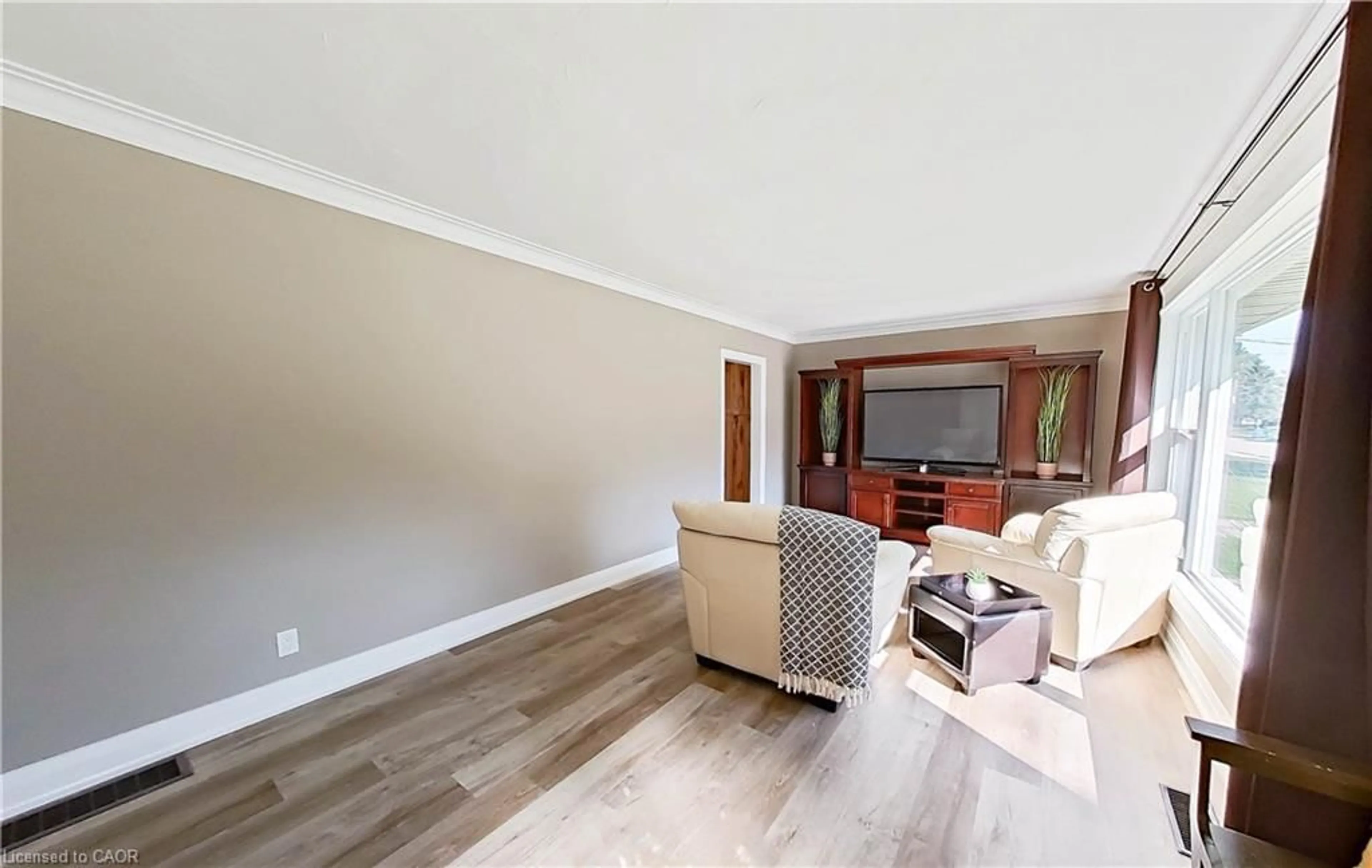 Living room with furniture, wood/laminate floor for 278 Queen St, Durham Ontario N0G 1R0