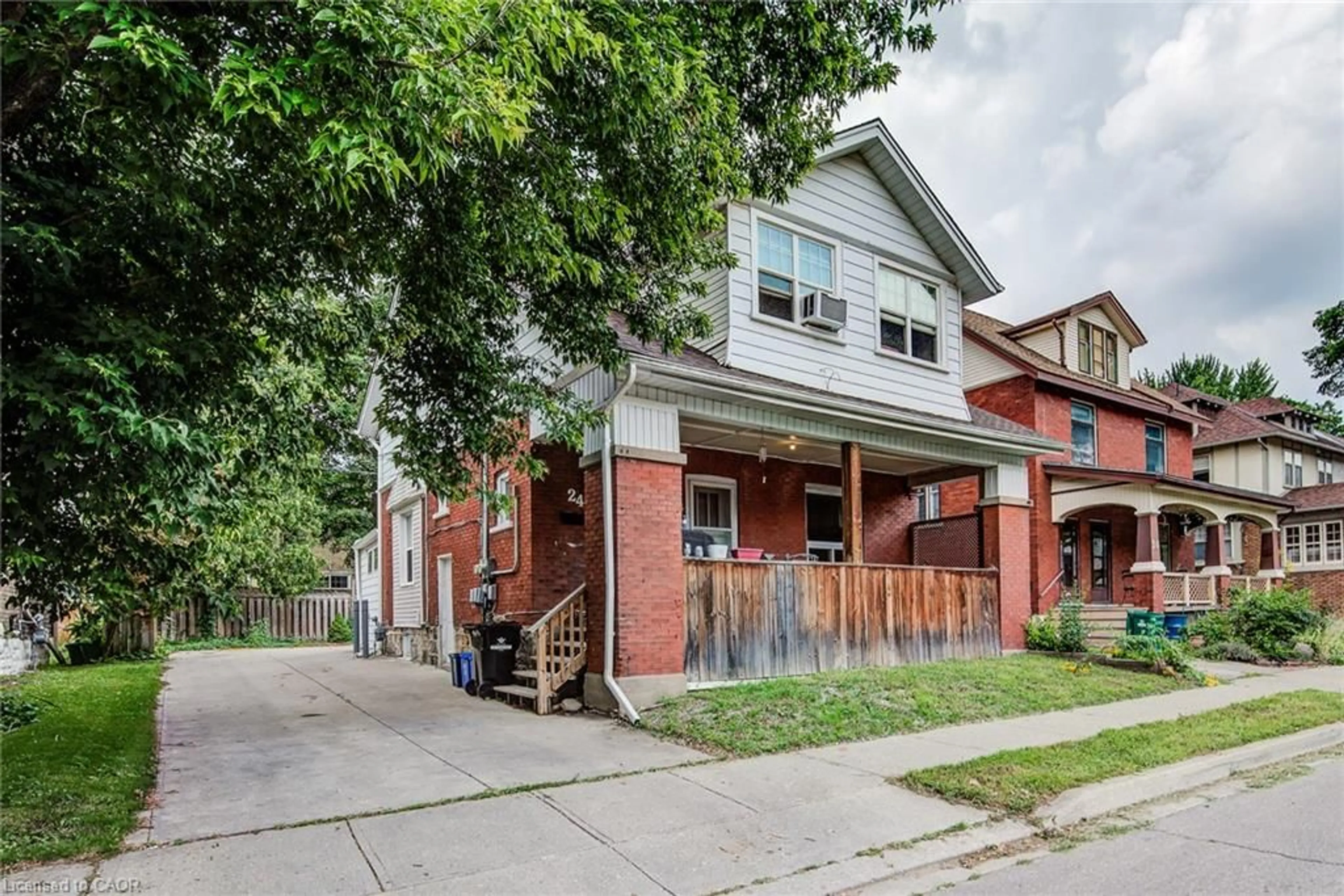 Home with brick exterior material, street for 24 Hohner Ave, Kitchener Ontario N2H 2V4
