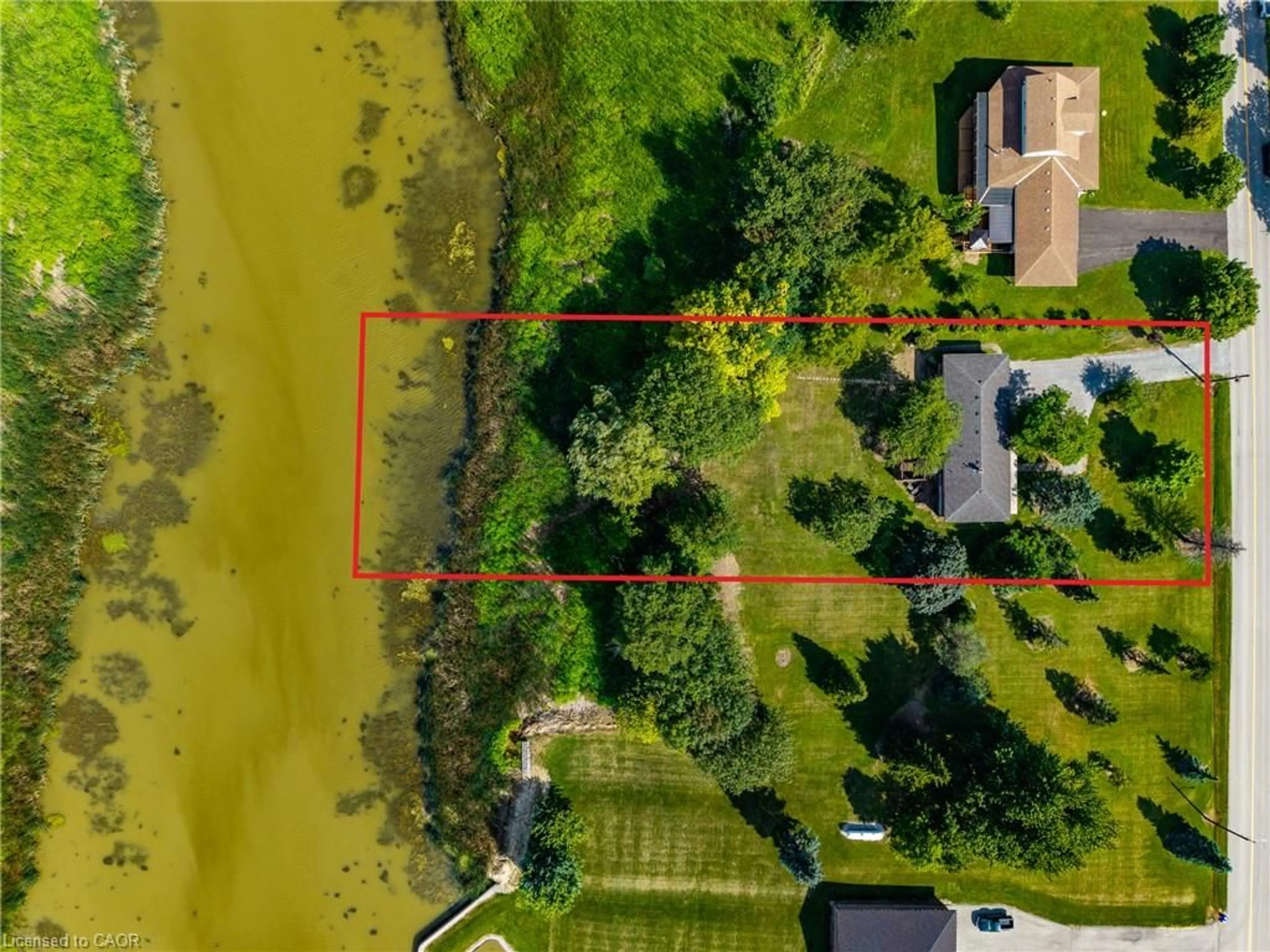 A pic from outside/outdoor area/front of a property/back of a property/a pic from drone, water/lake/river/ocean view for 107 Erie St, Nanticoke Ontario N0A 1L0