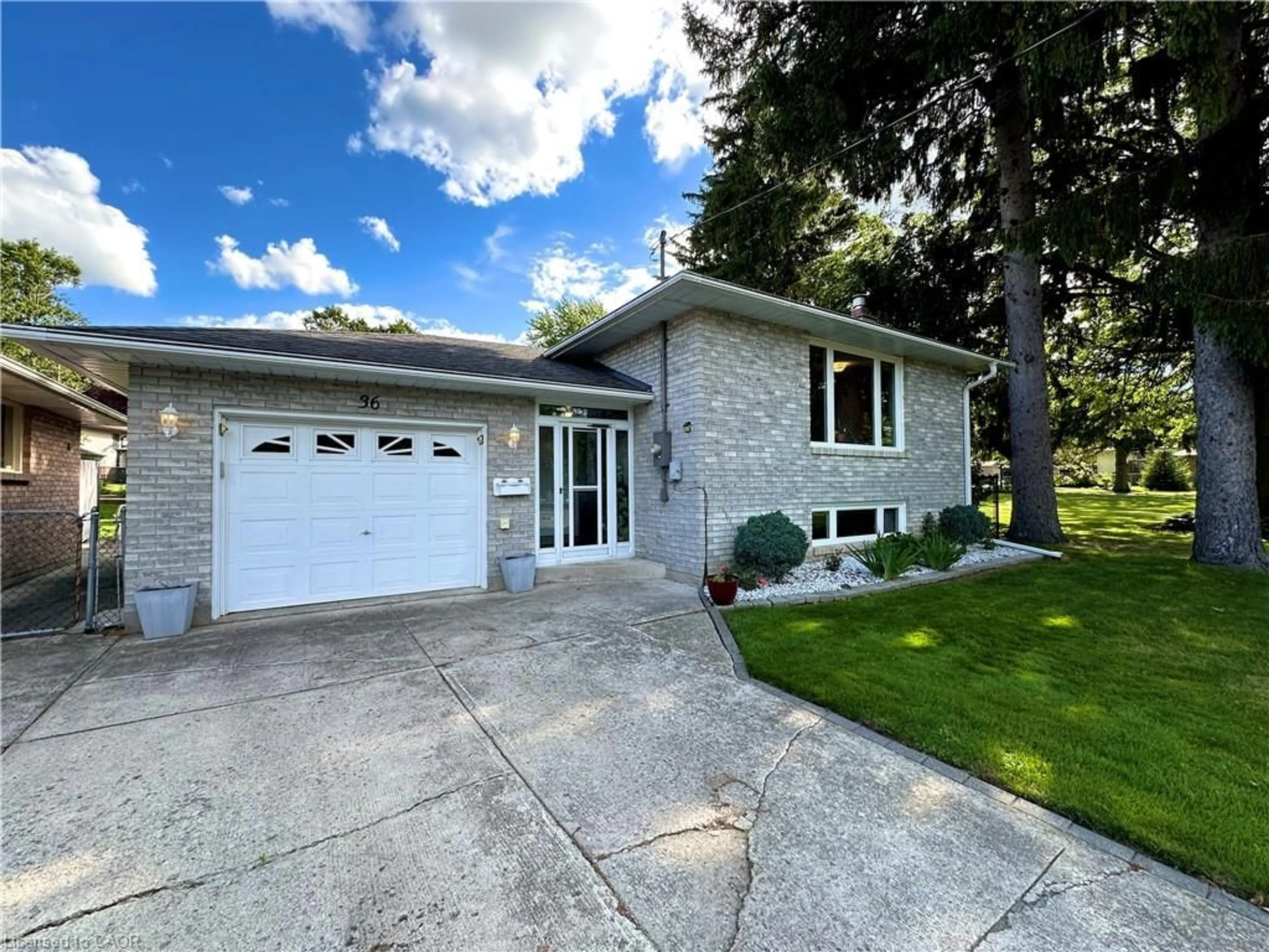 Home with brick exterior material, street for 36 Oakhill Dr, Brantford Ontario N3T 1R1